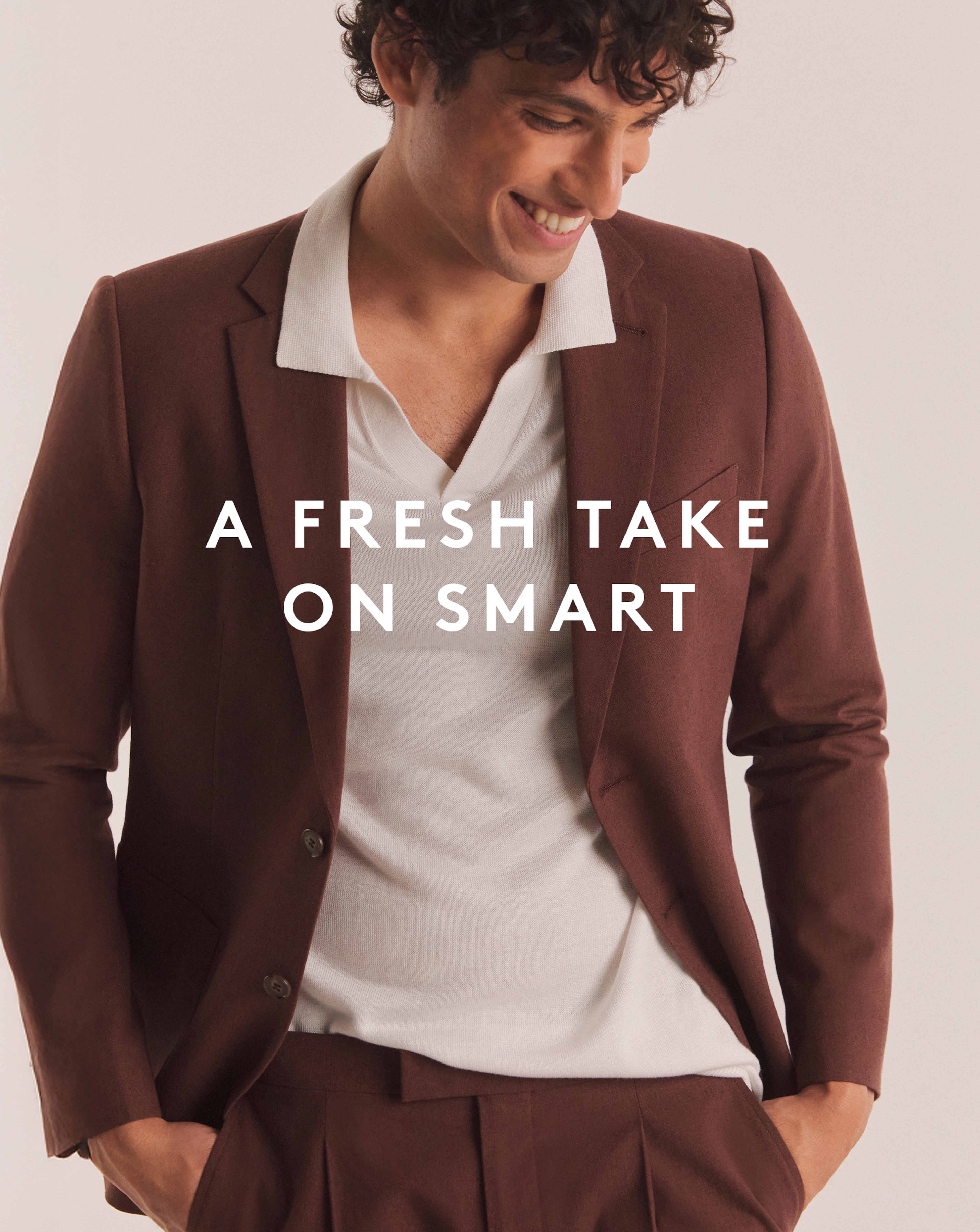 A Fresh Take on Smart. Model wears Linen Patch Pocket Blazer with Trousers