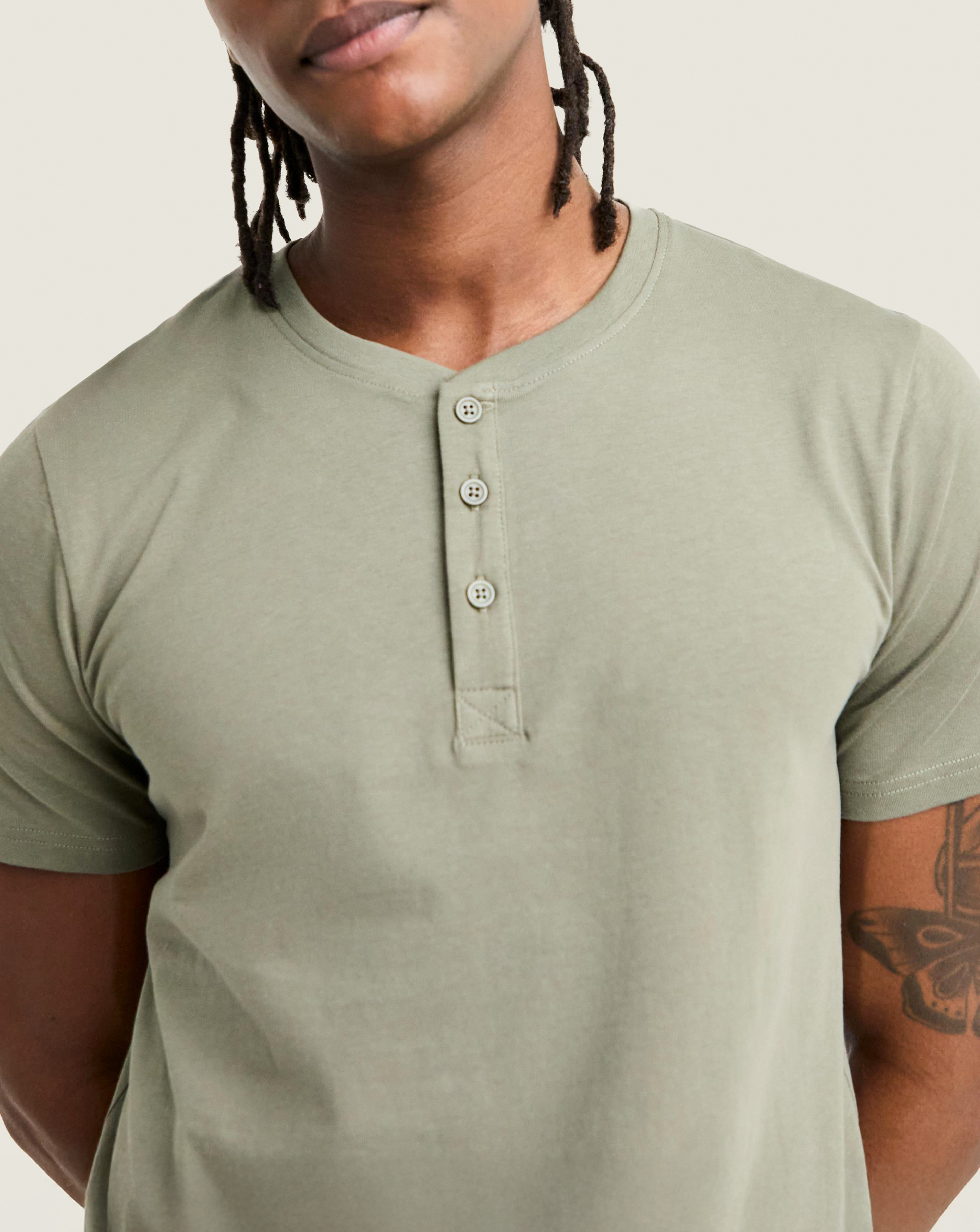 Model wears Grandad T-Shirt in Light Khaki