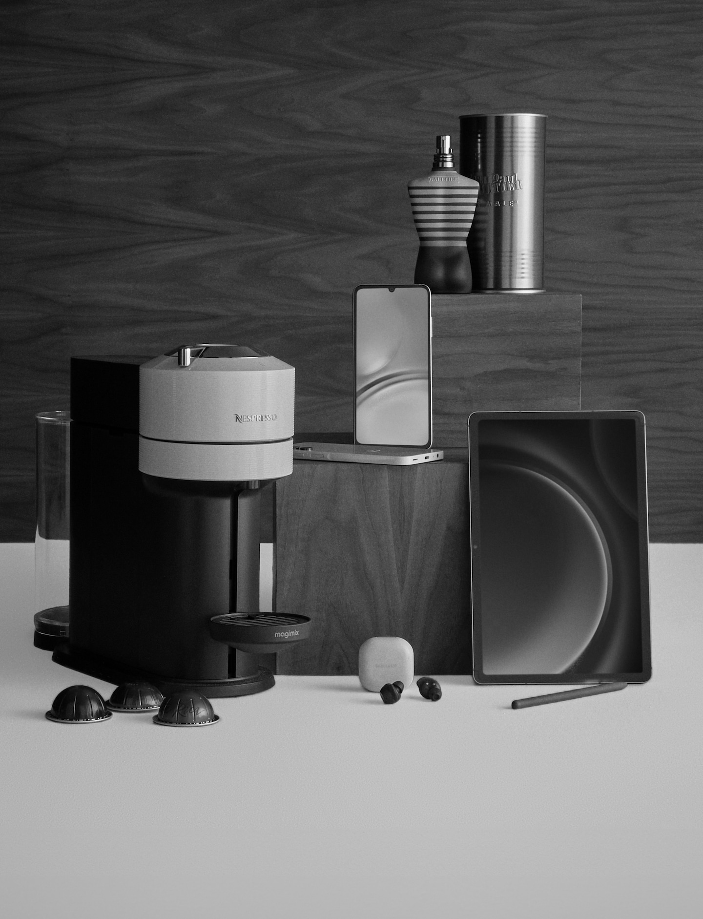 Gifting image. Nespresso machine, ear pods, iPhone and Samsung tablet pictured