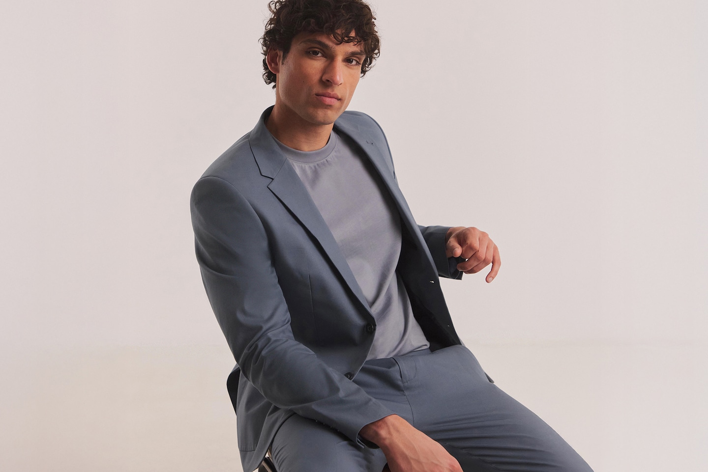 Patch Pocket Blazer and Trousers pictured with model wearing blue t-shirt