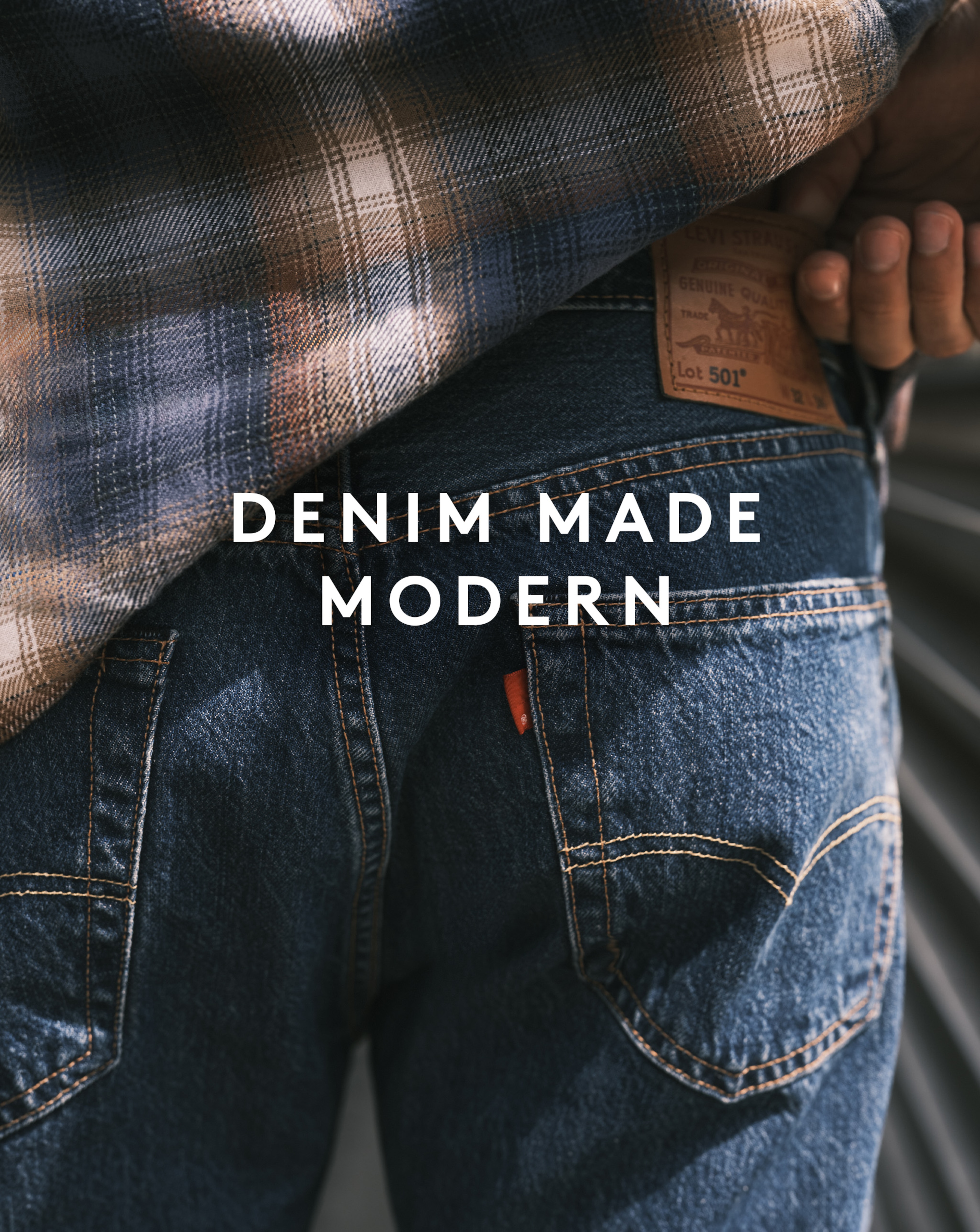 Model wearing dark Levi's jeans