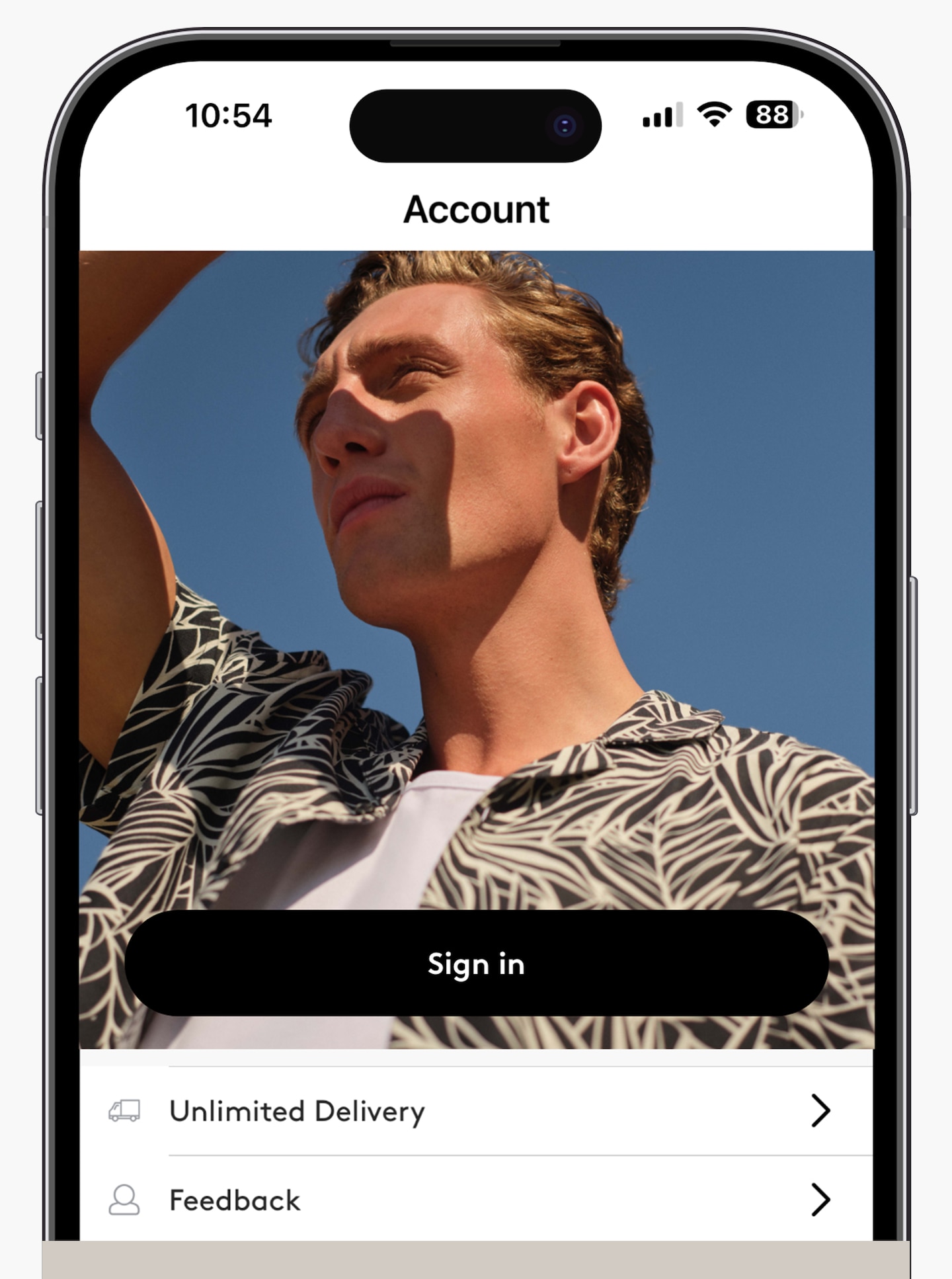 Jacamo app account sign in page featuring a summer image of model wearing summer against a blue sky.