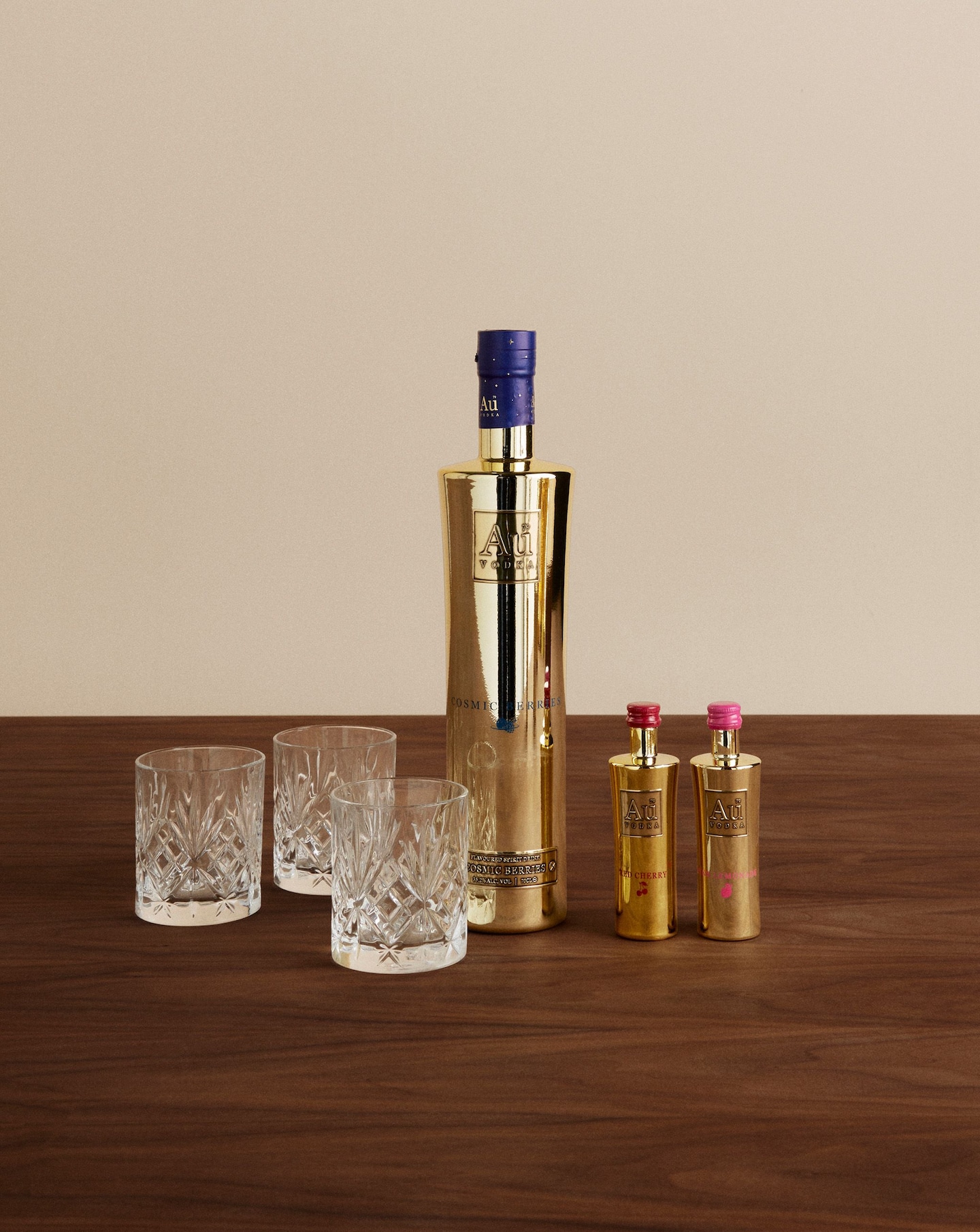 a bottle of spirits and glass tumblers