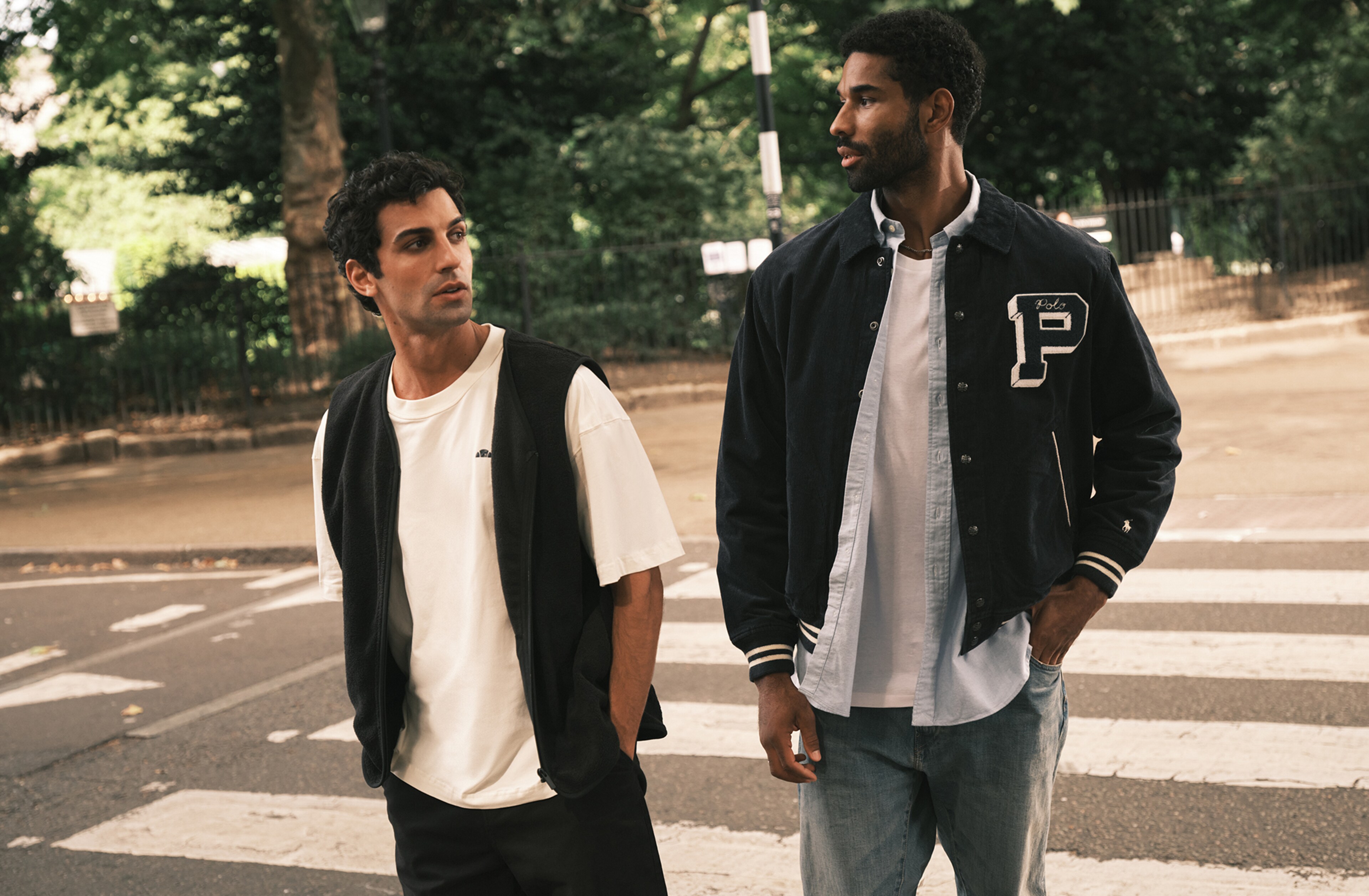 Model wears Polo Ralph Lauren bomber style jacket and Polo Ralph Lauren Classic Long Sleeve Oxford Shirt