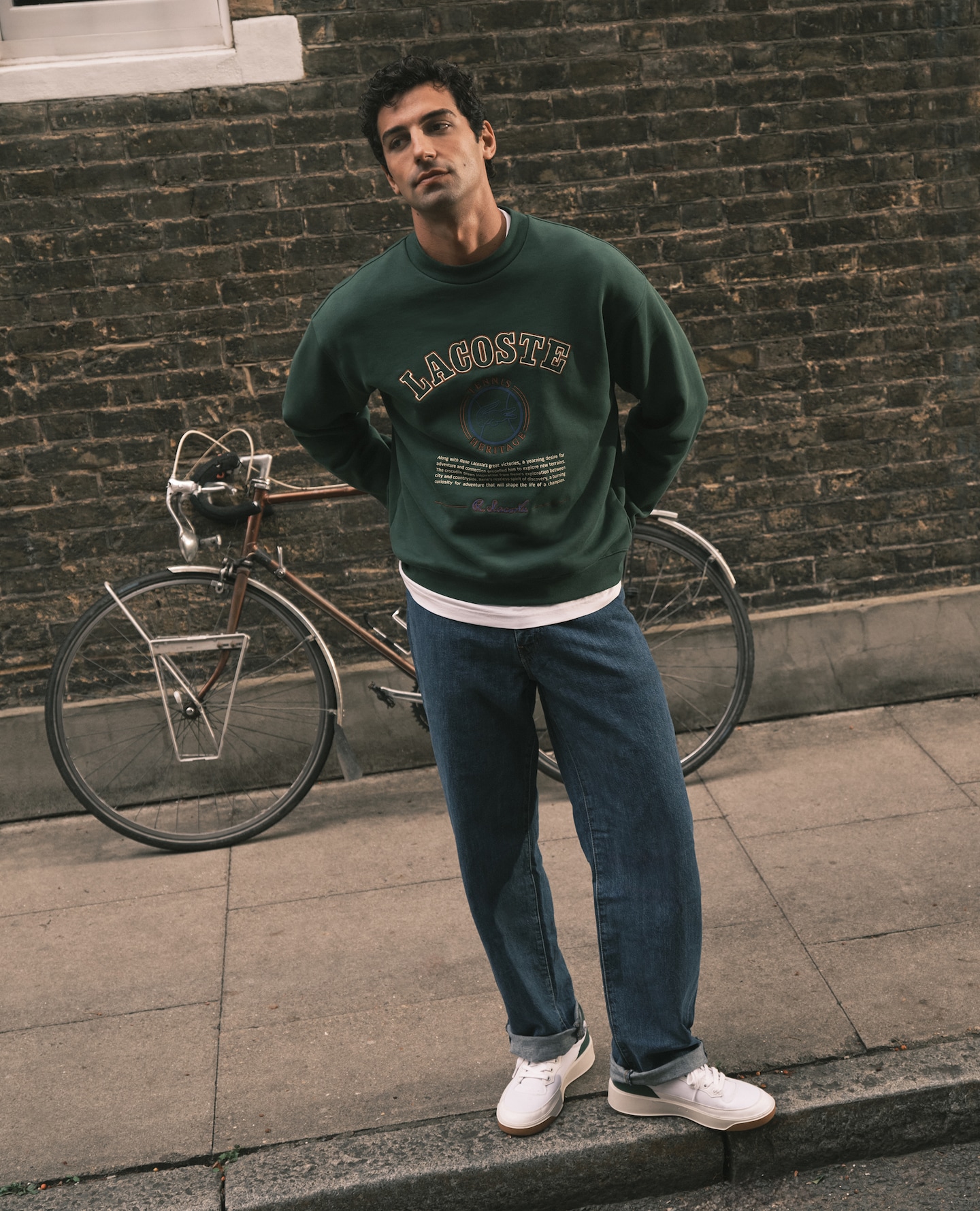 Model wears Lacoste Graphic Crew Sweat - Green