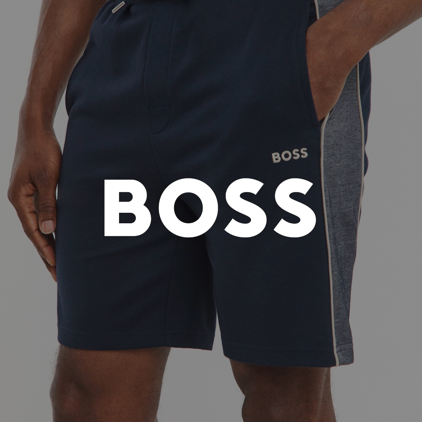 BOSS. Model wears BOSS Classic Lounge Tracksuit Short - Navy