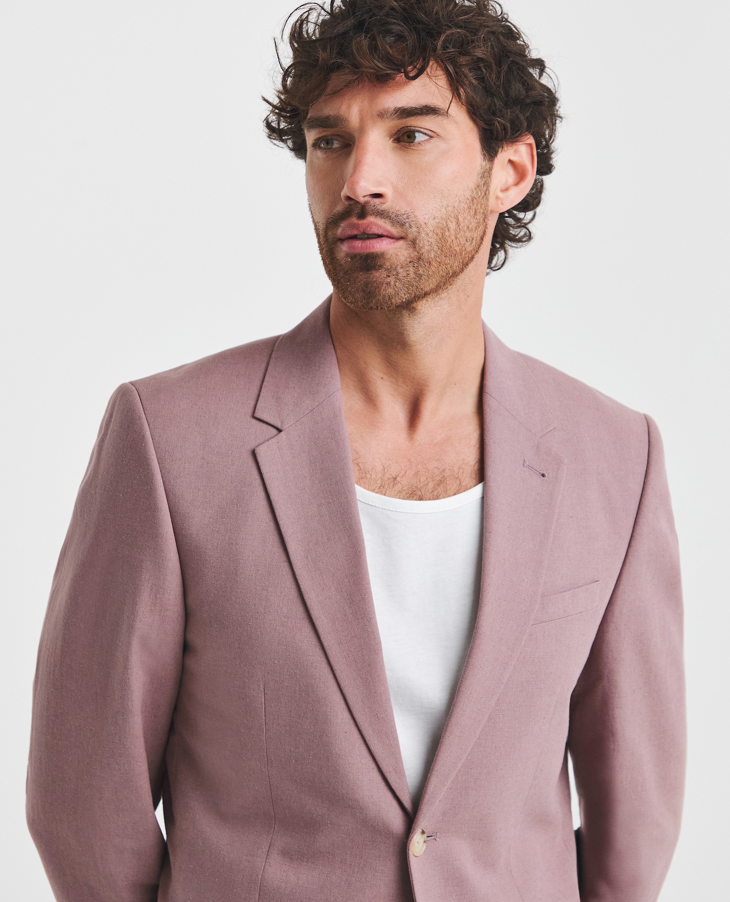 Model wearing pink blazer