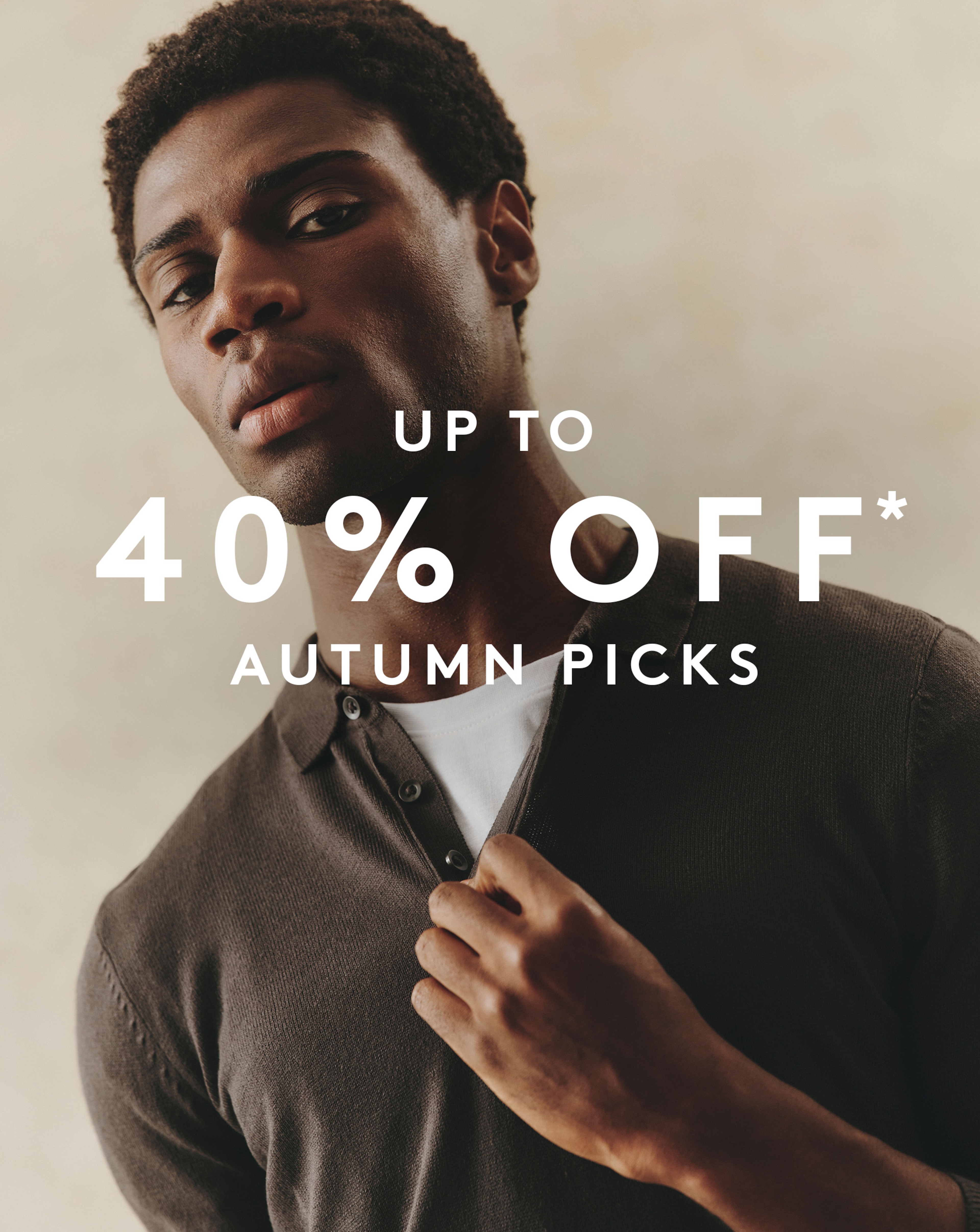 Model wearing a brown polo with sale offer written over the top - 40% off autumn picks