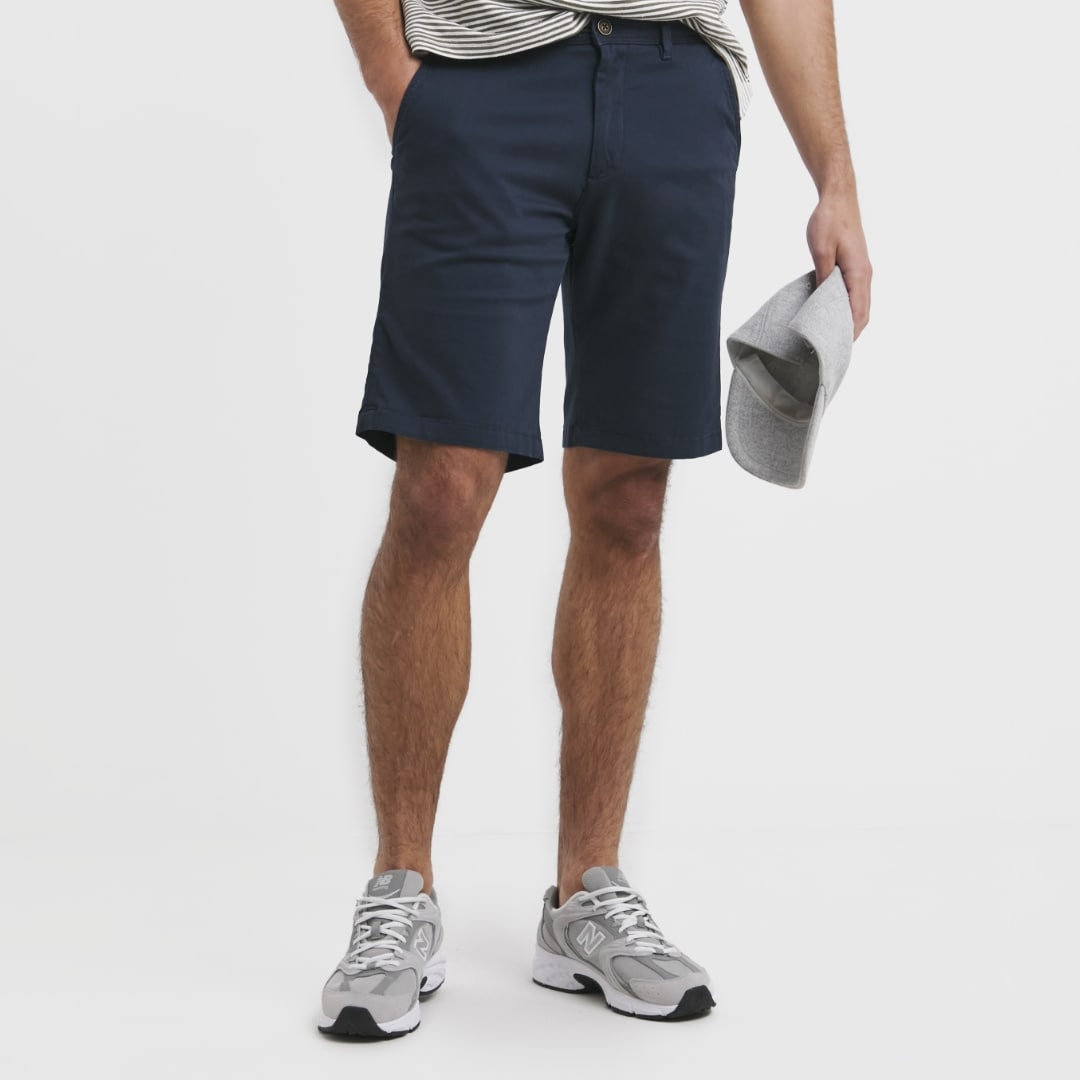 Model wearing navy Jack & Jones shorts