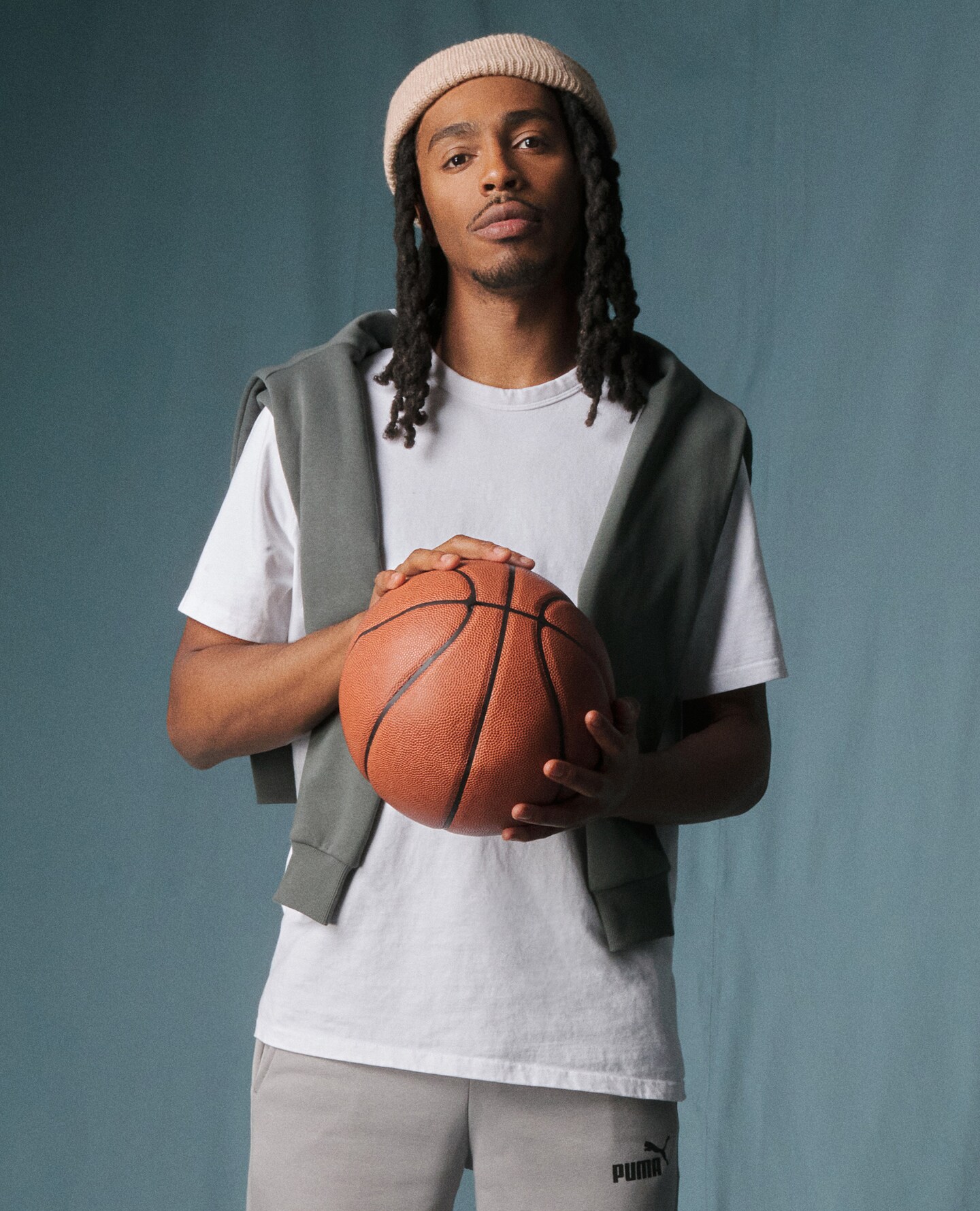 A man wearing a white t-shirt