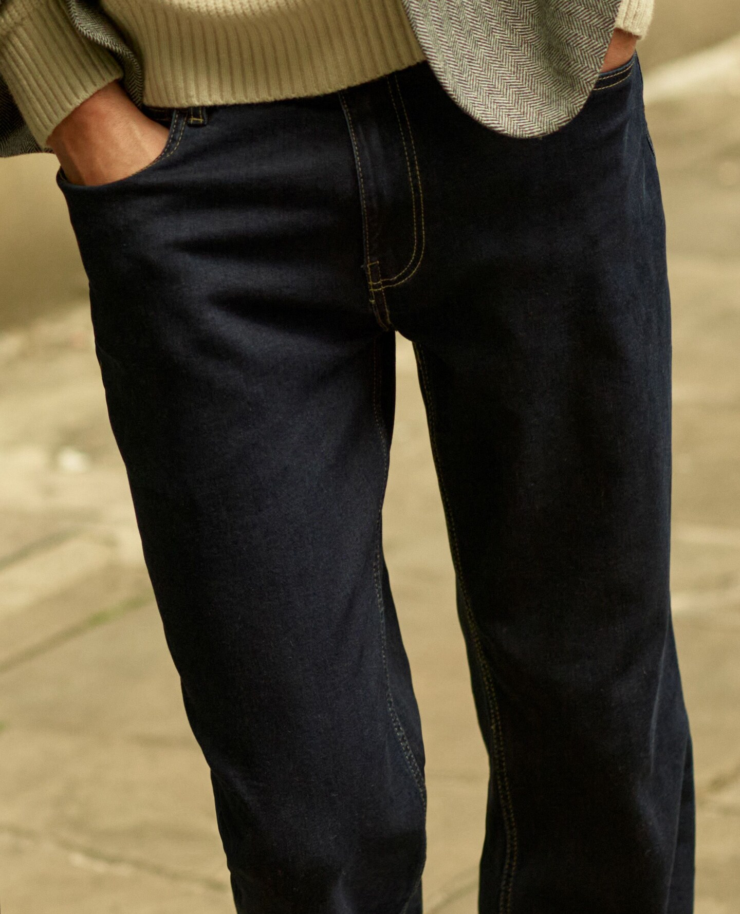 A man wearing black jeans