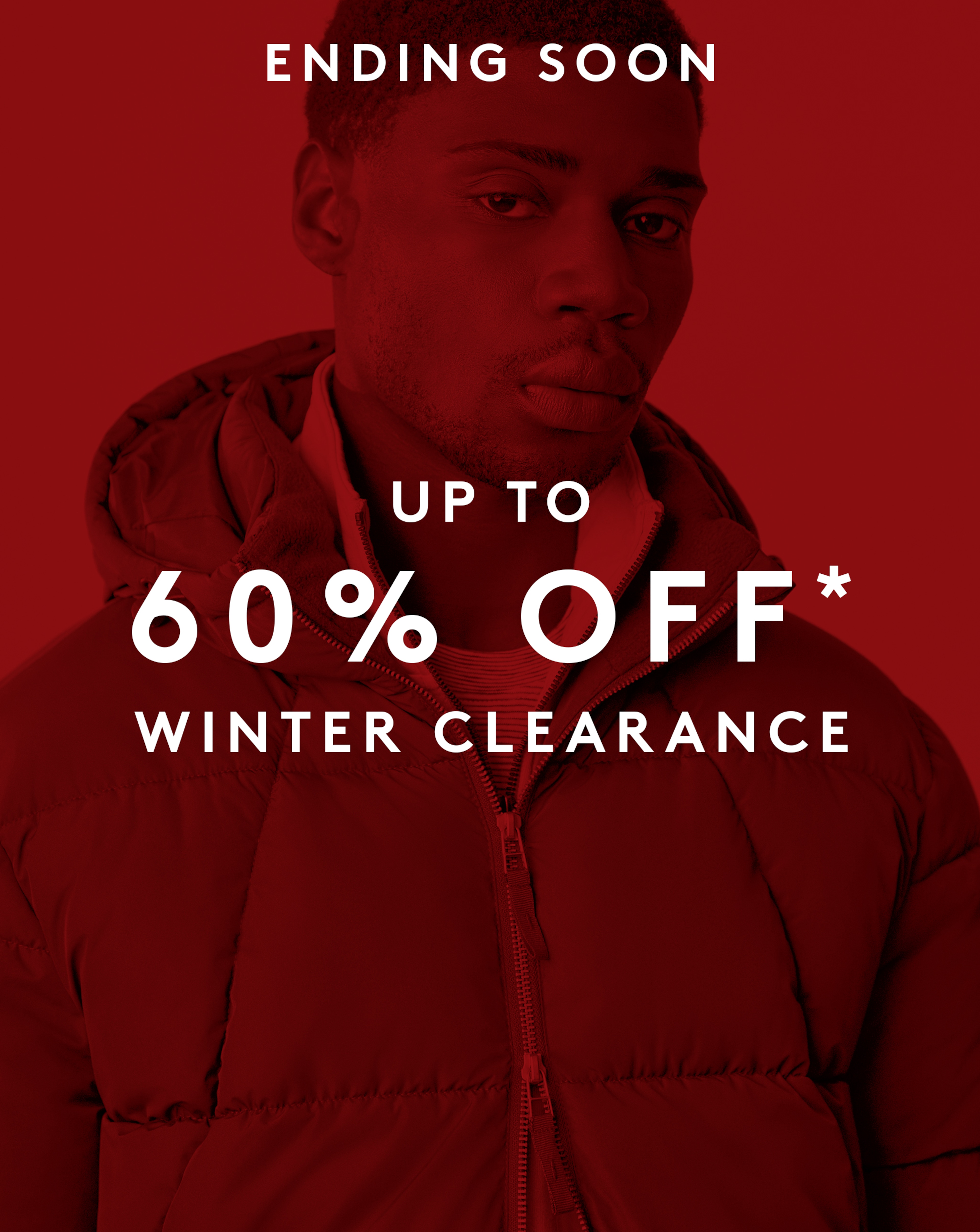 Ending soon. Up to 60% Off* Winter Clearance. Model wears puffer coat within red backdrop