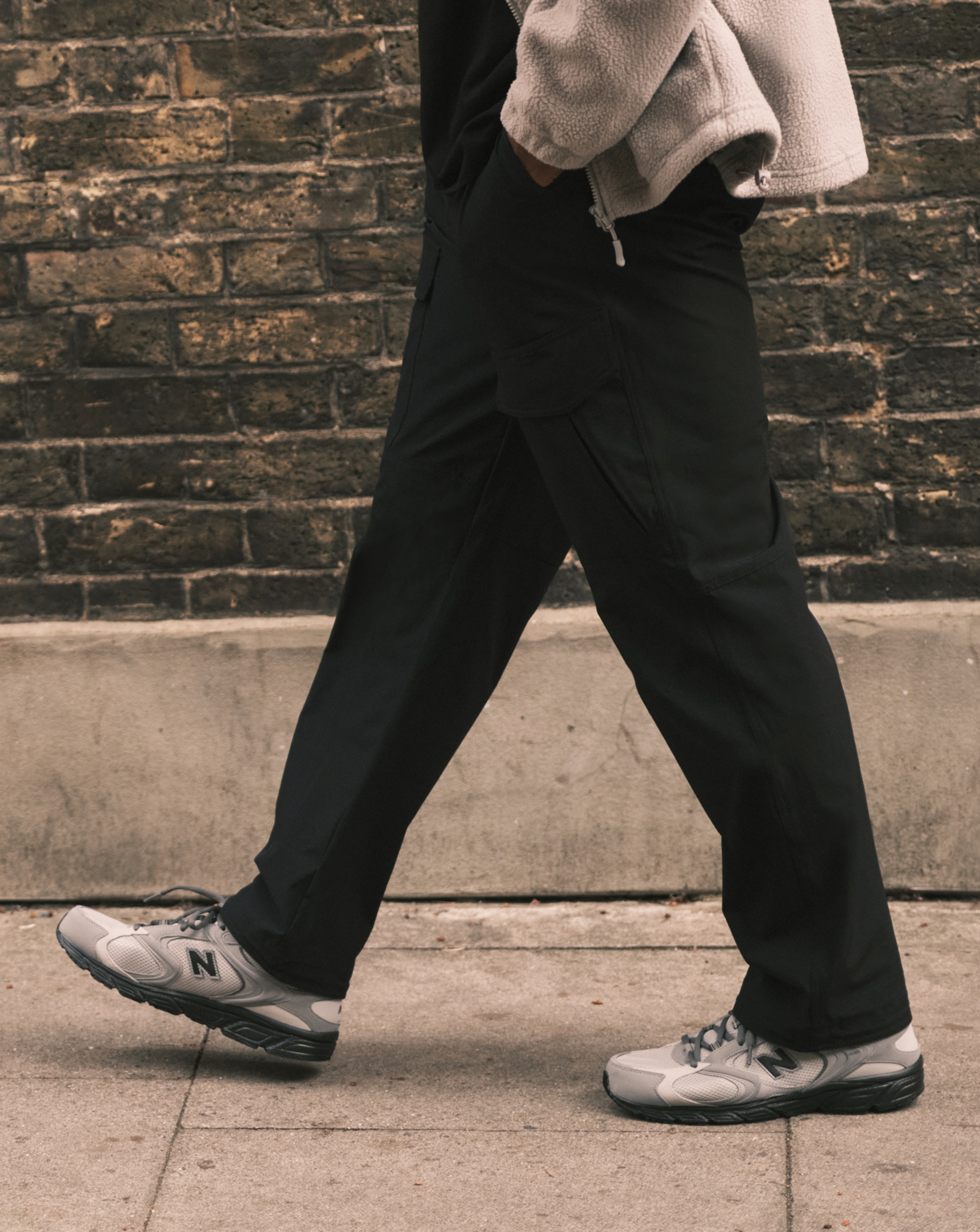 Model wears Twill Cargo Trouser with New Balance 408 Trainers