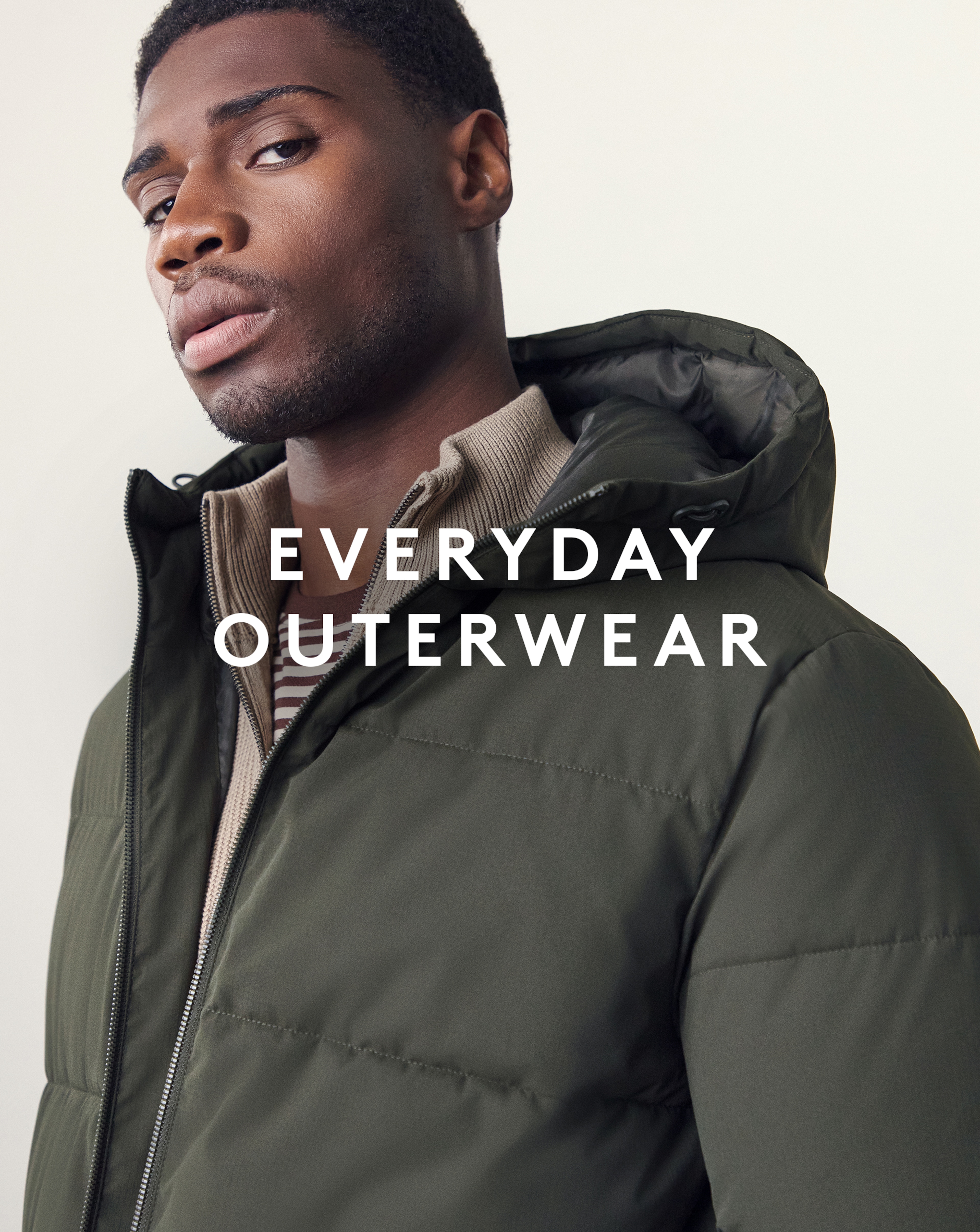 Everyday Outerwear. Model wears Jack & Jones Global Puffer Coat - Green