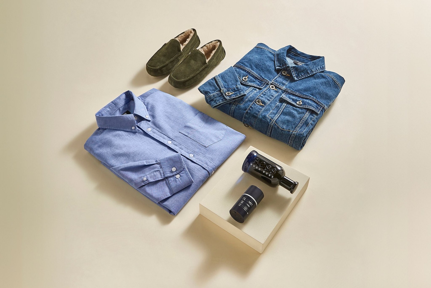 Denim shirt, denim jacket, slippers and Hugo Boss fragrance displayed