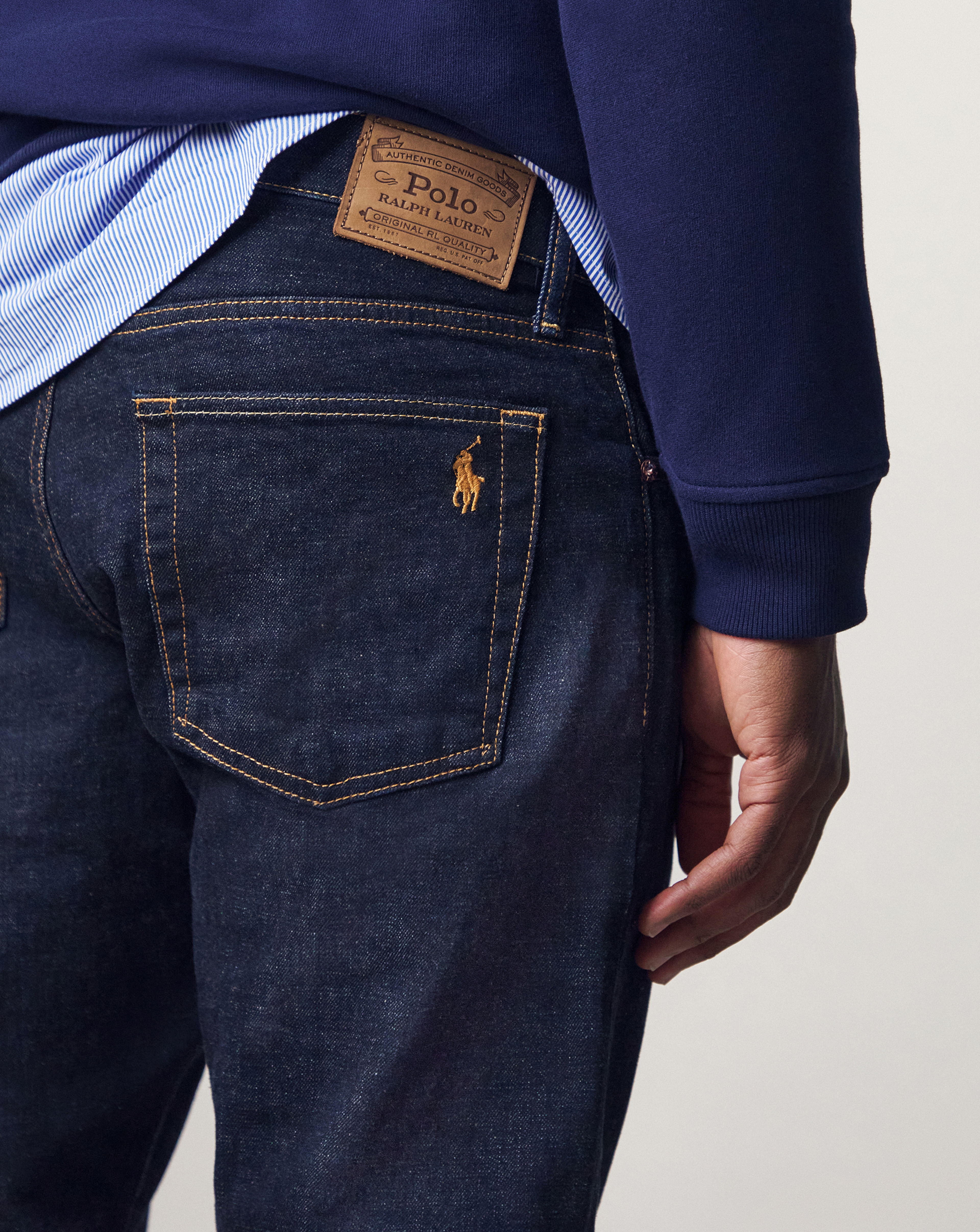 Modela wears Polo Ralph Lauren Hampton 5 Pocket Straight Jean - Dark Wash