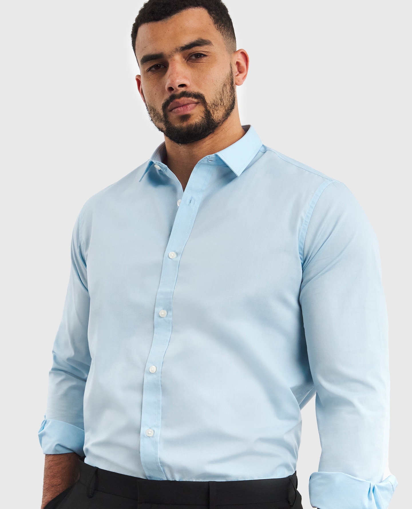 Model wearing blue shirt
