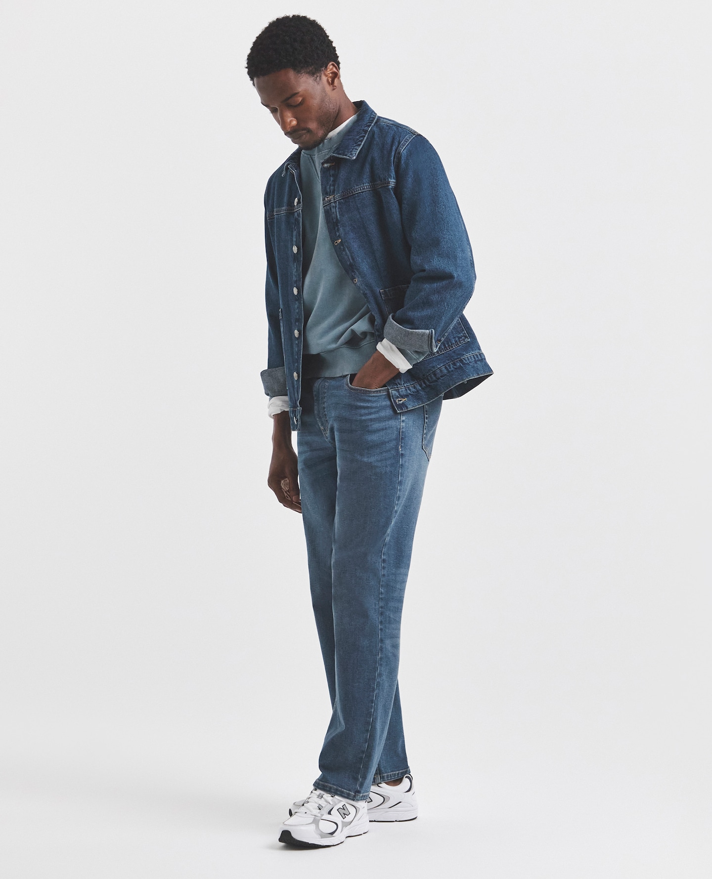 Model wearing denim jacket and jeans