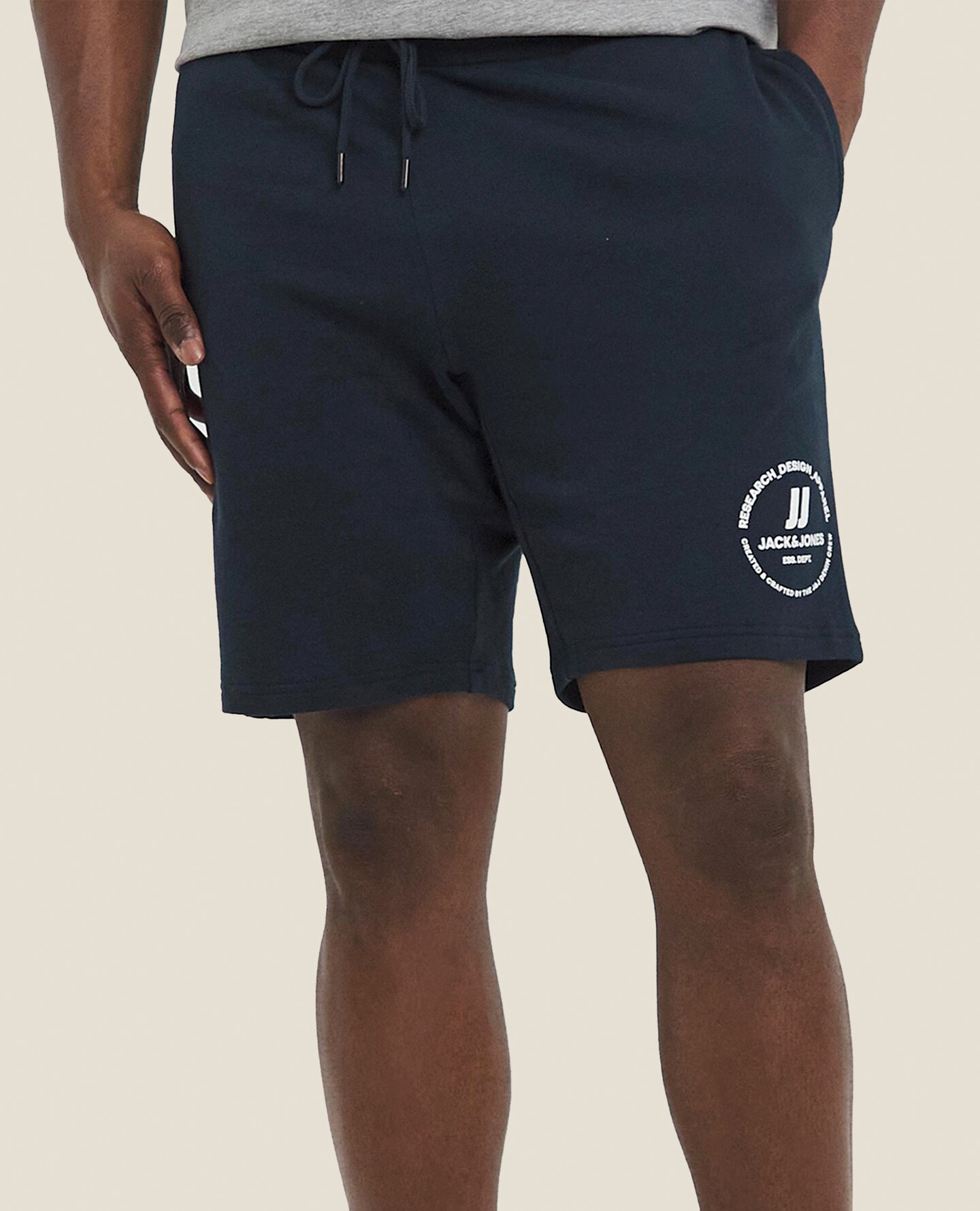 Model wears Jack & Jones Swift Sweat Short - Navy Blazer