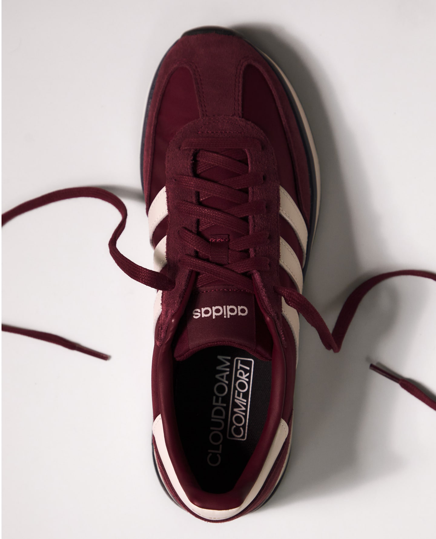 adidas Run 70s 2.0 Trainers in Dark Red are pictured