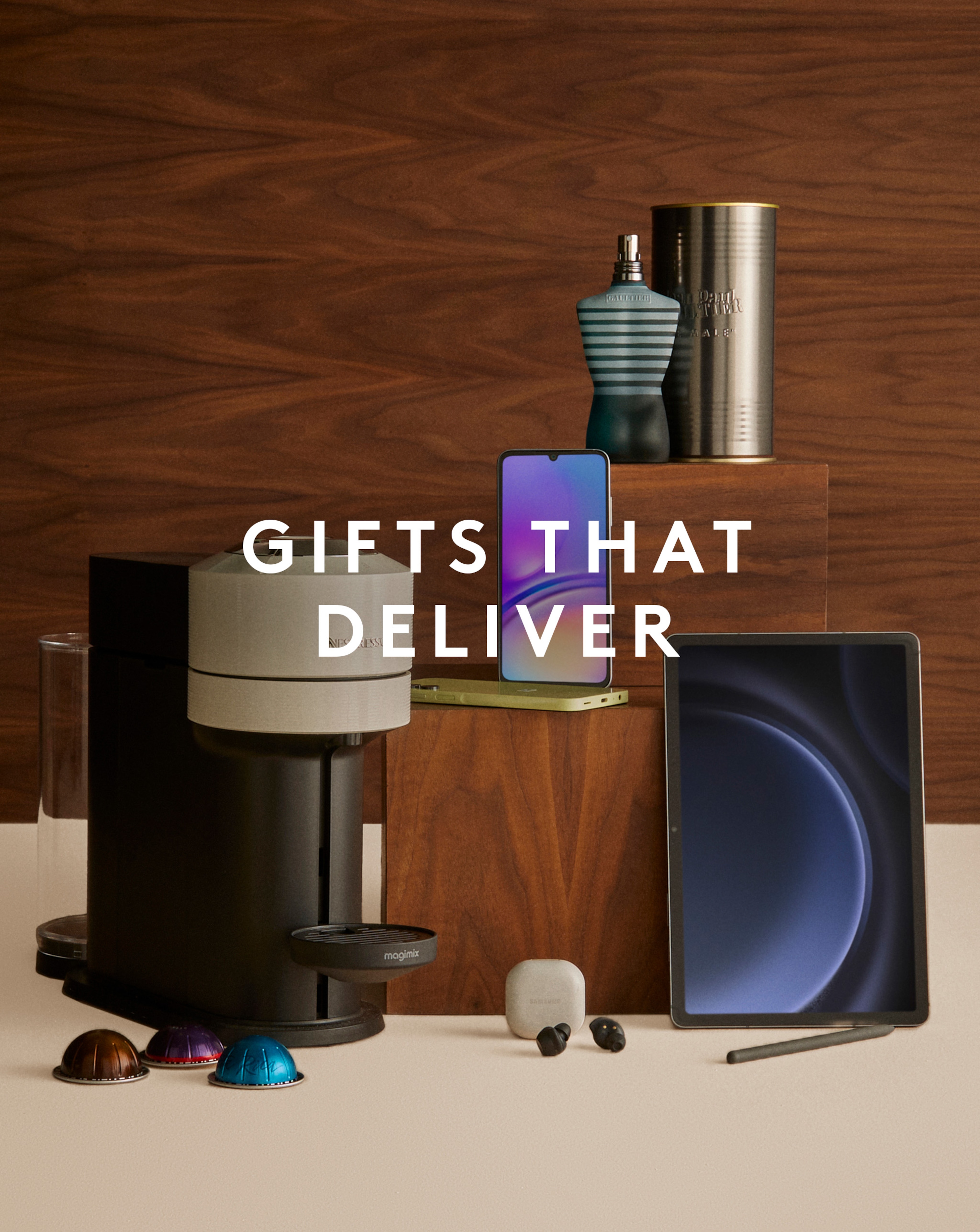 Various luxury gifts on display, including and iPad and coffee machine