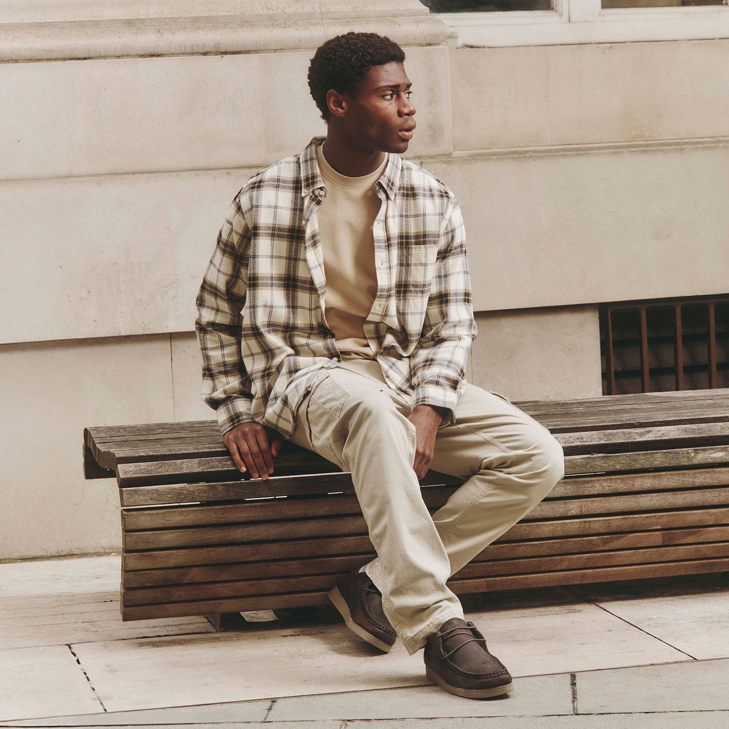 Model wears Cotton Rich Flannel Check Shirt Regular with Elasticated Waist Cuffed Cargo in Cream
