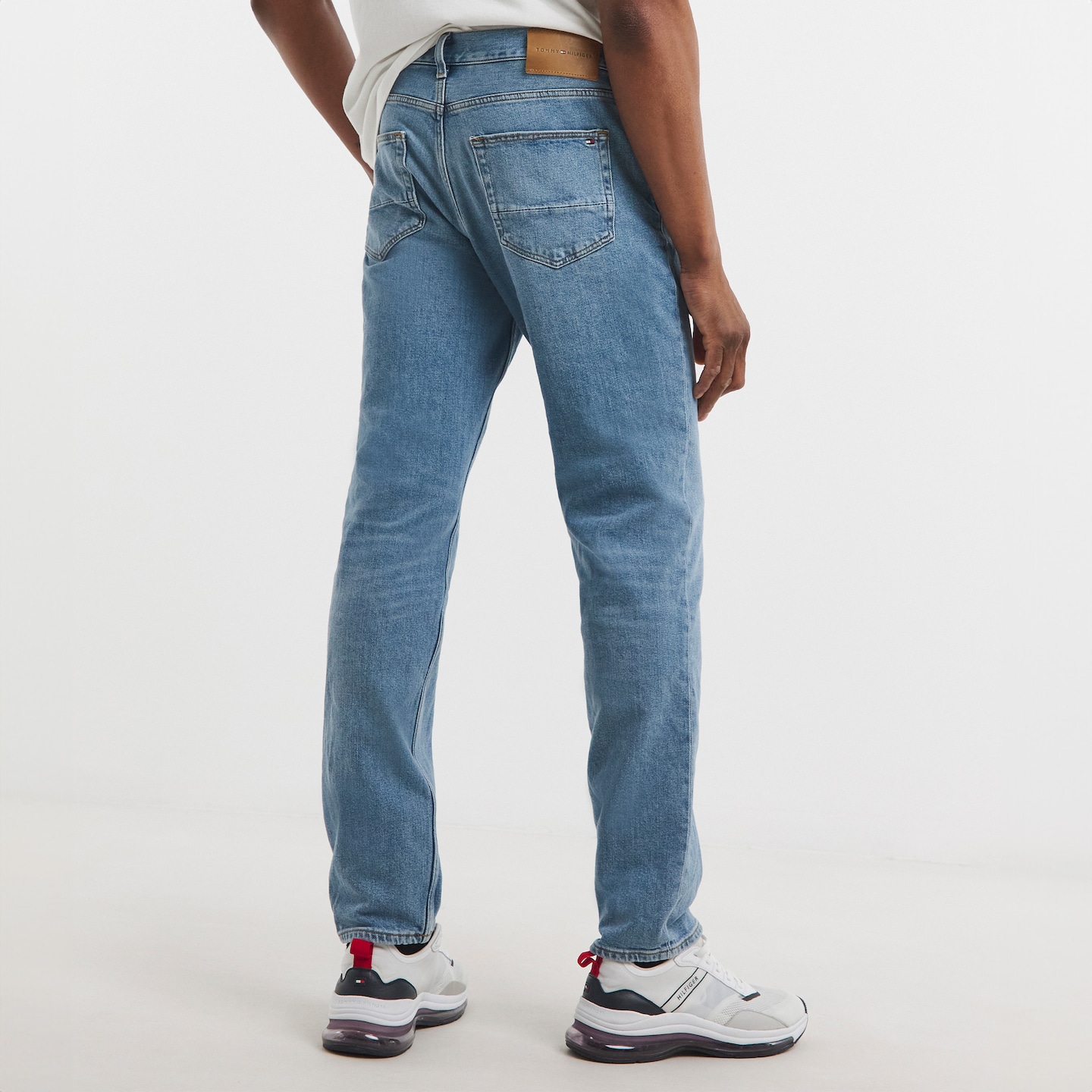 Model wearing Tommy Hilfiger jeans