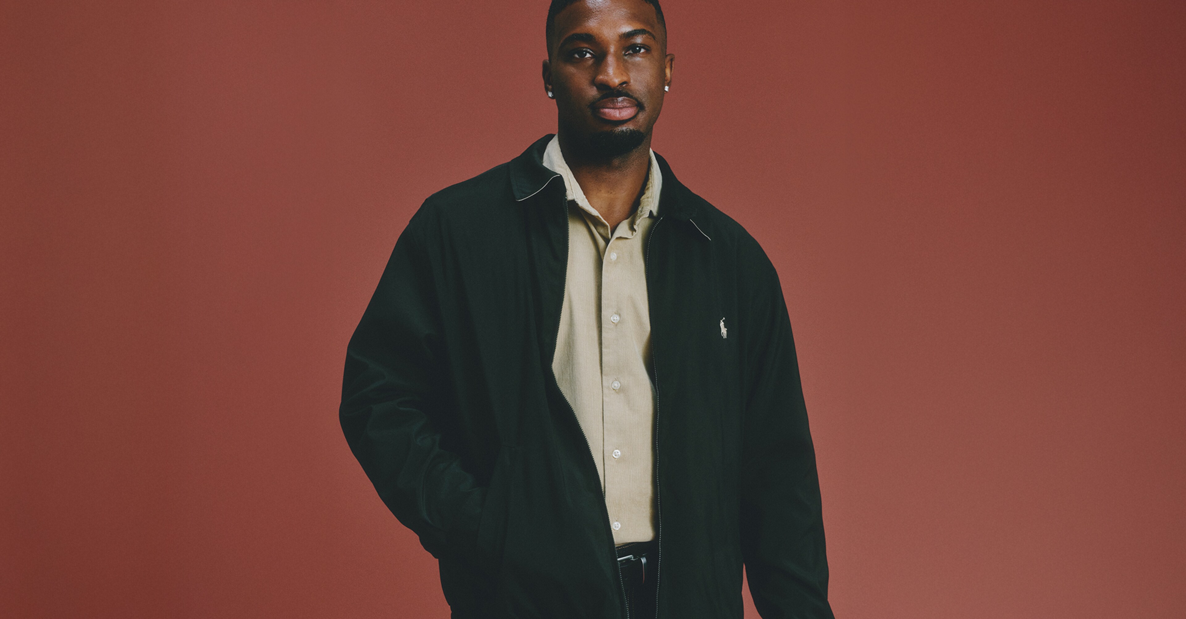 Model wears Polo Ralph Lauren Jacket with Polo Ralph Lauren Long Sleeve Cordury Shirt