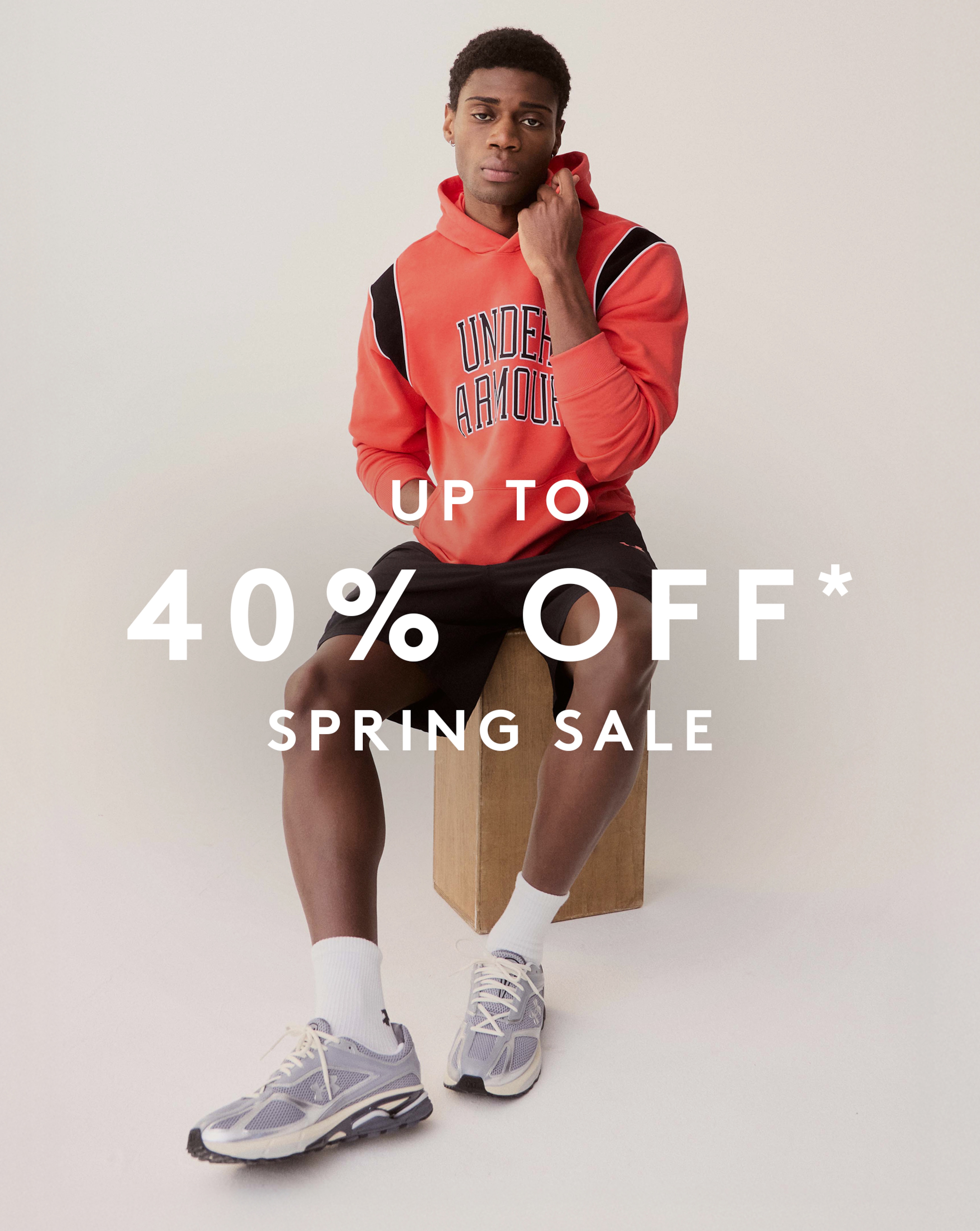 Up to 40% Off* Spring Sale. Model wears Under Armour Rival Fleece Graphic Hoodie