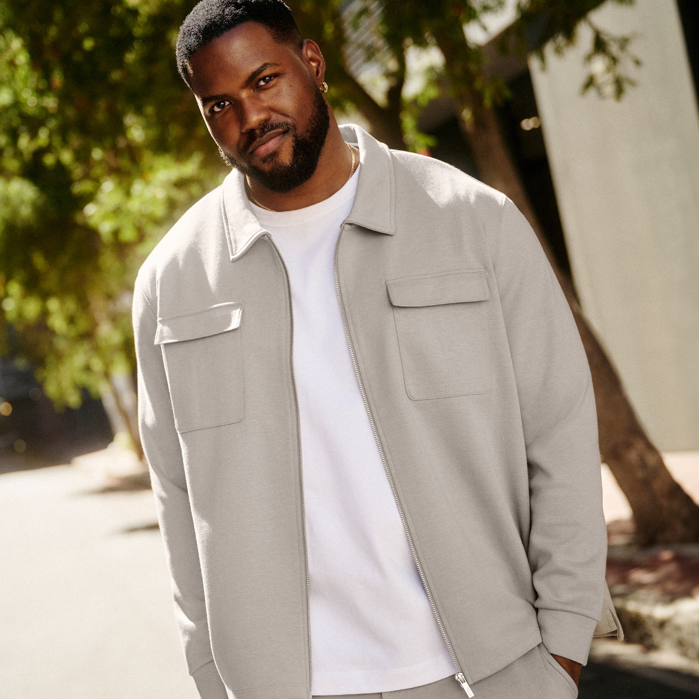 Model wears Folio Interlock Zip Shacket