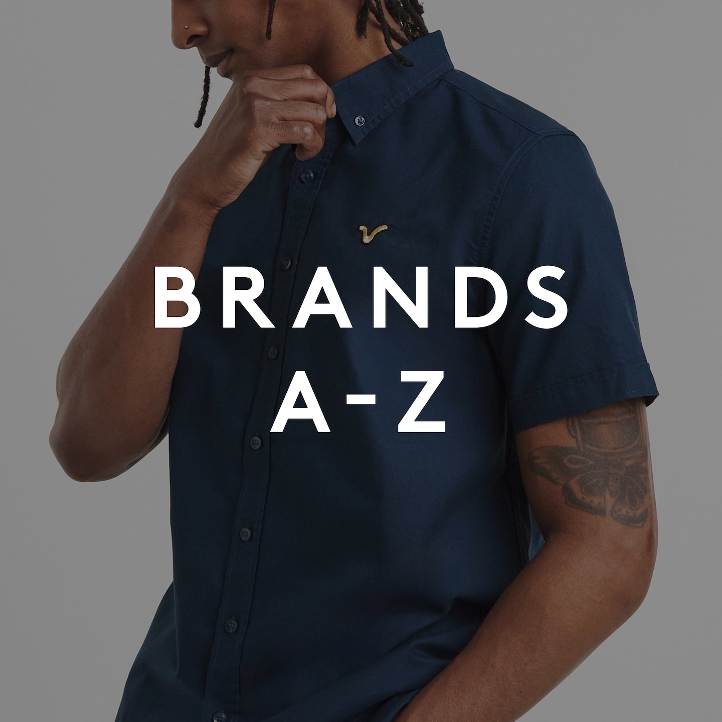 Brands A-Z. Model wears Voi Storm Short Sleeve Oxford Shirt Long Length
