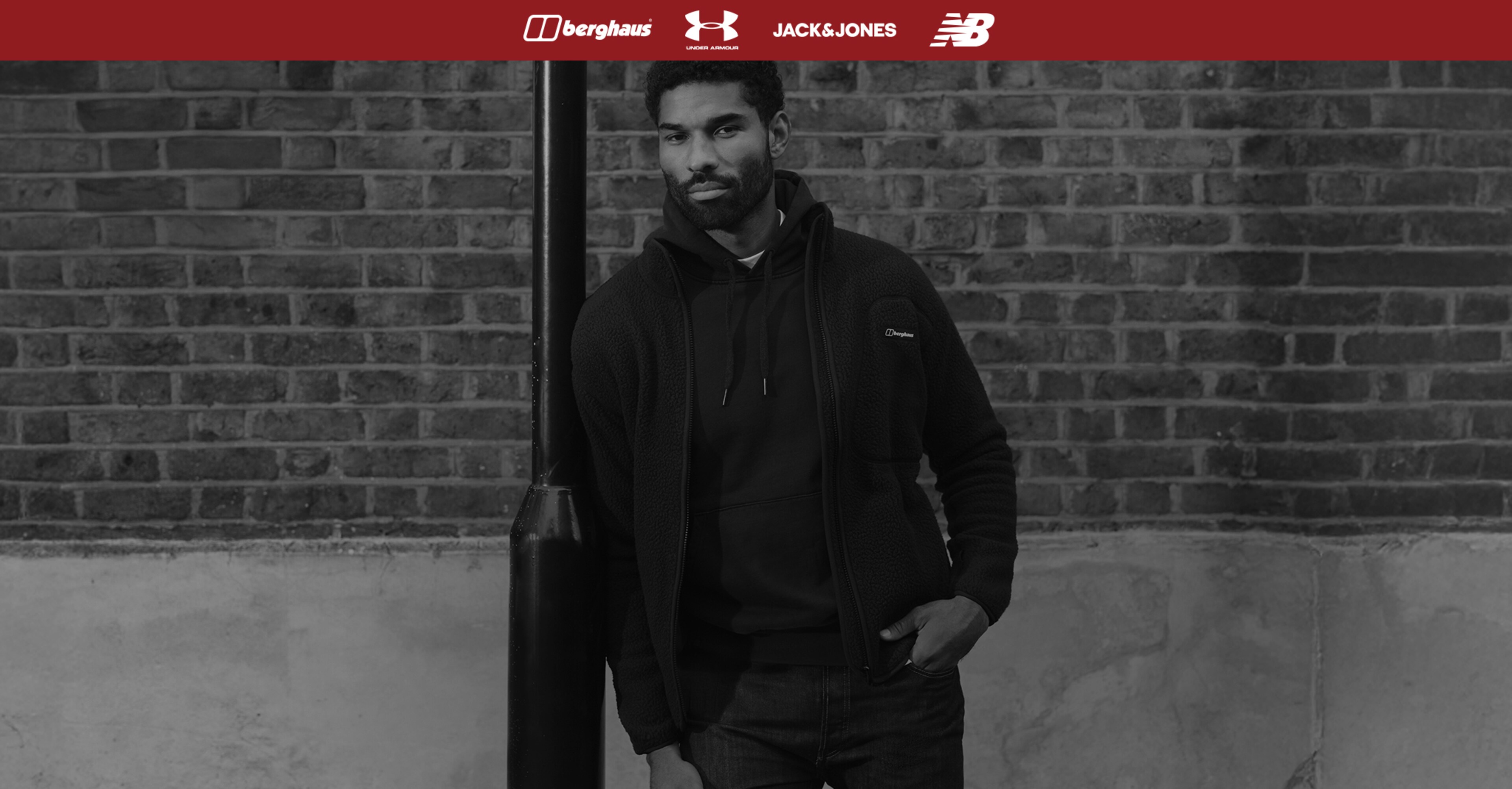 Model stood by lamp post wears Berghaus Hanby Jacket. Brand Event including Bergaus, Undeer Armour, Jack & Jones and New Balance