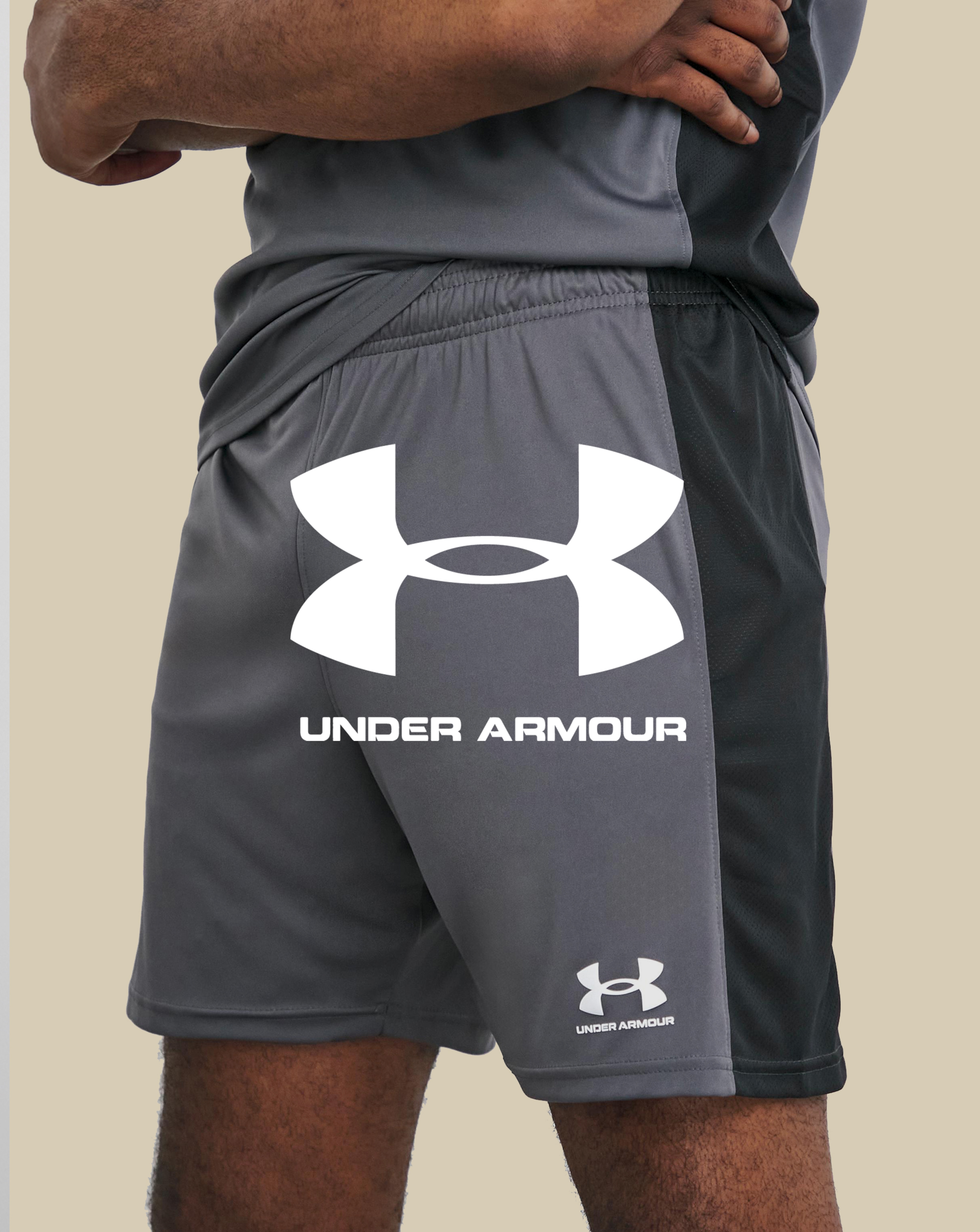 Under Armour. Model wears Under Armour Challenger Knit Short