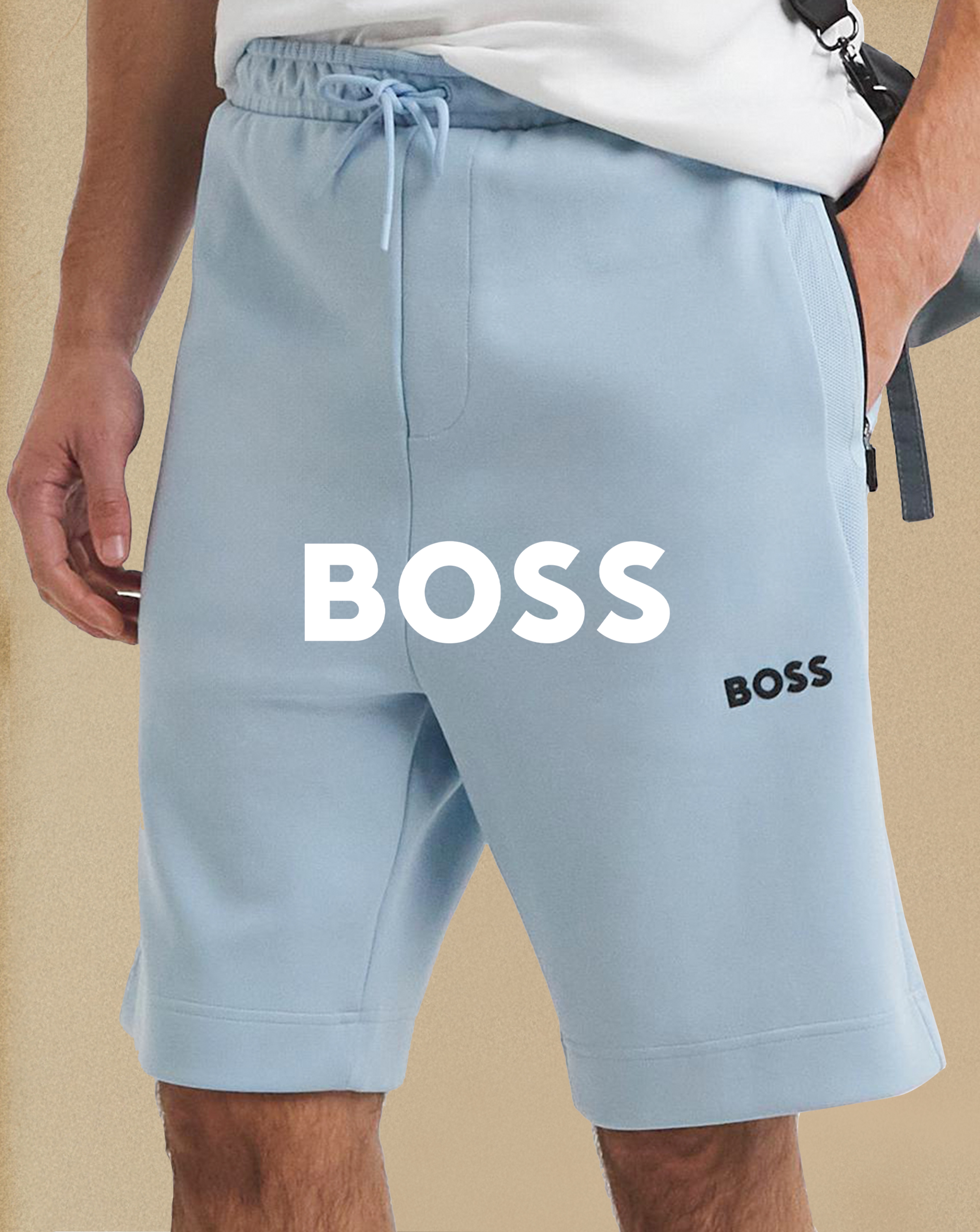 BOSS. Model wears BOSS Light Blue Sweat Short