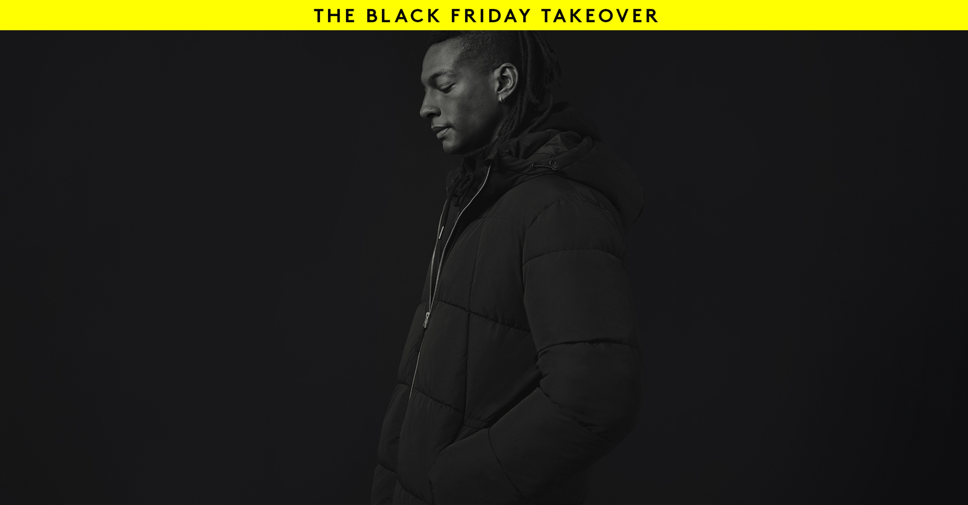 The Black Friday Takeover. Model wears Black Mid Length Puffer Jacket