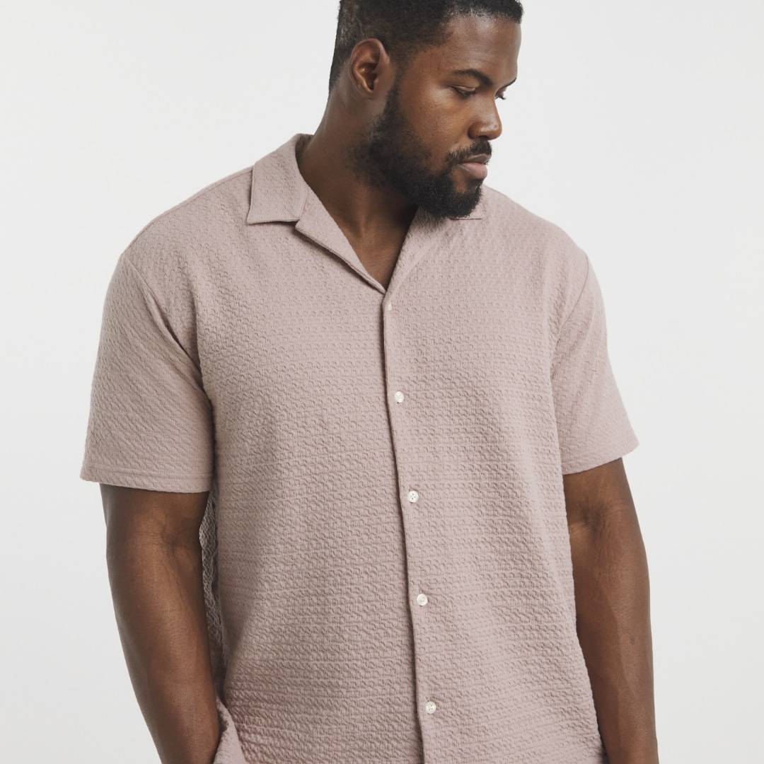 Model wearing pink Jack & Jones shirt