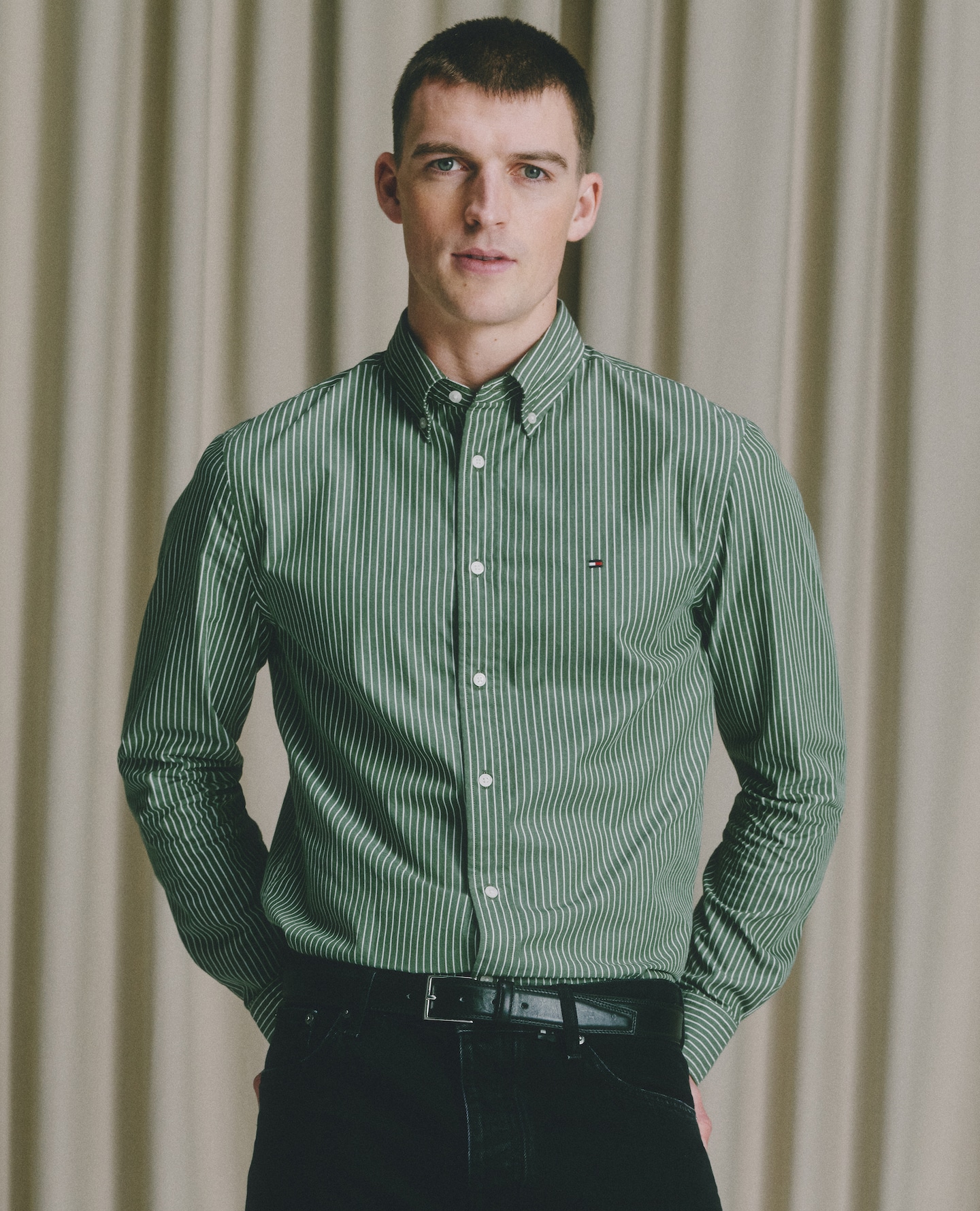 Model wears Tommy Hilfiger Long Sleeve Stripe Poplin Shirt - Pine Green