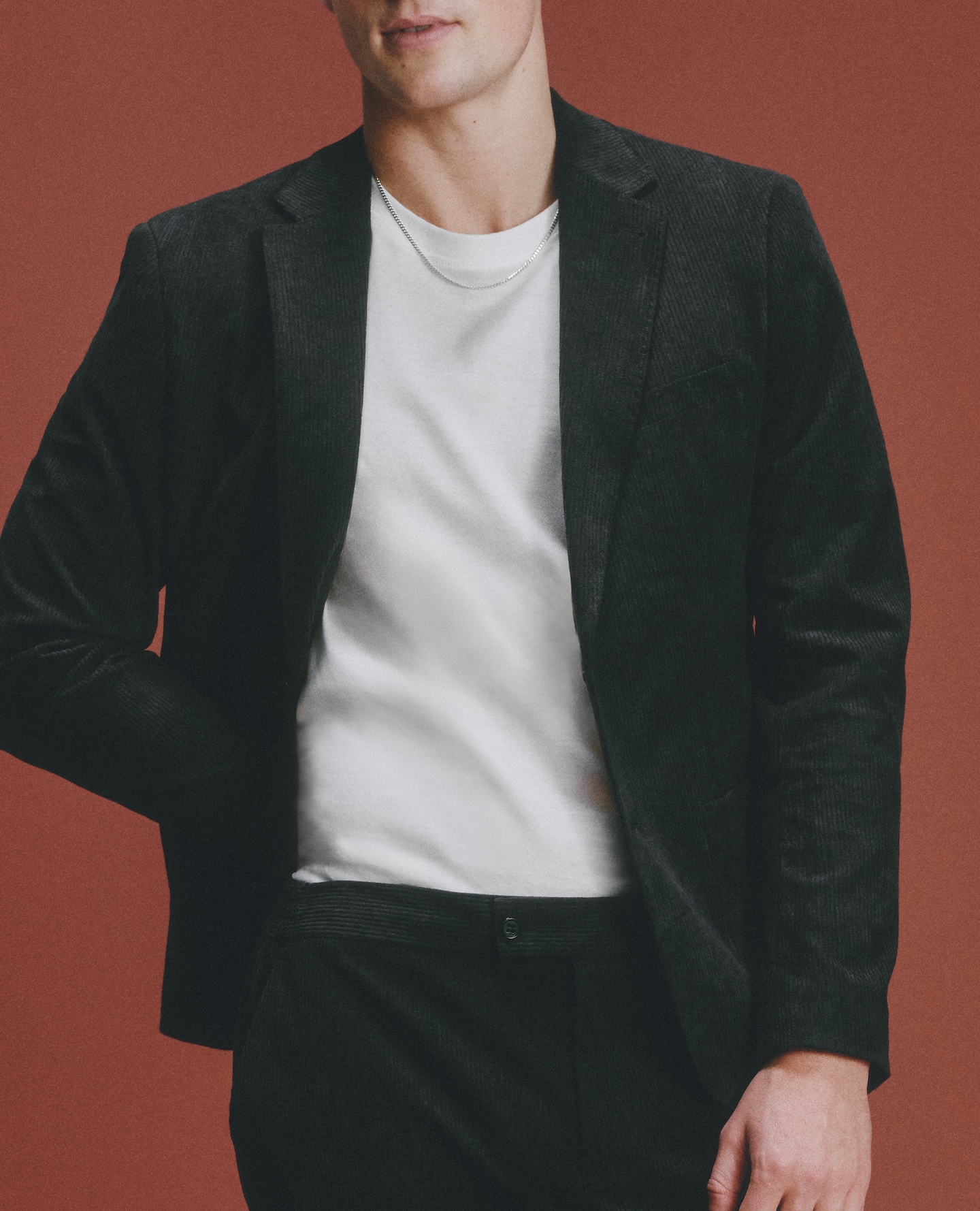 Model wears Cord Patch Pocket Blazer with white tee