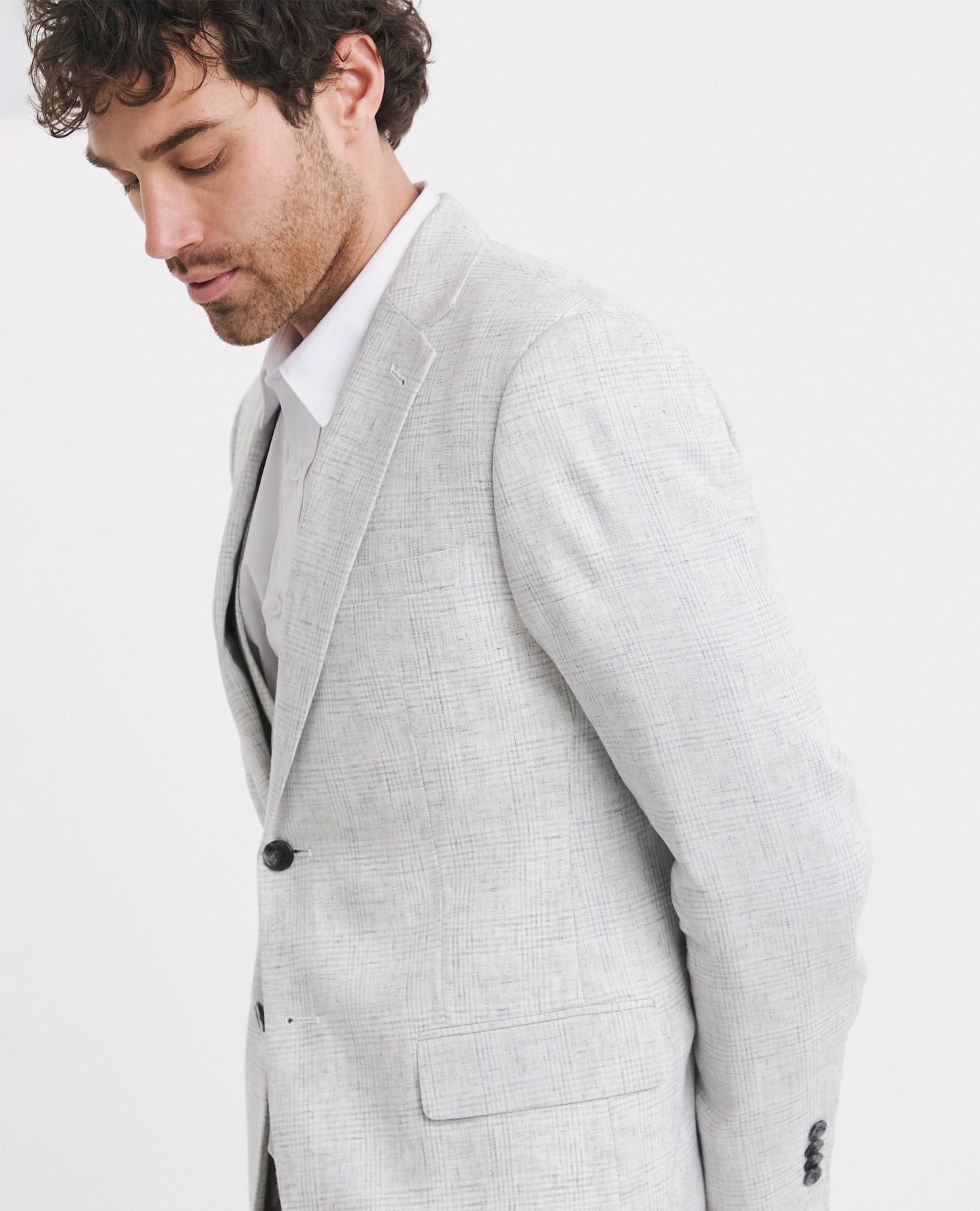 Model wearing grey suit