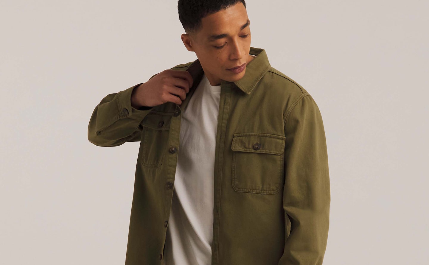Model wears Twill Overshirt with white T-shirt