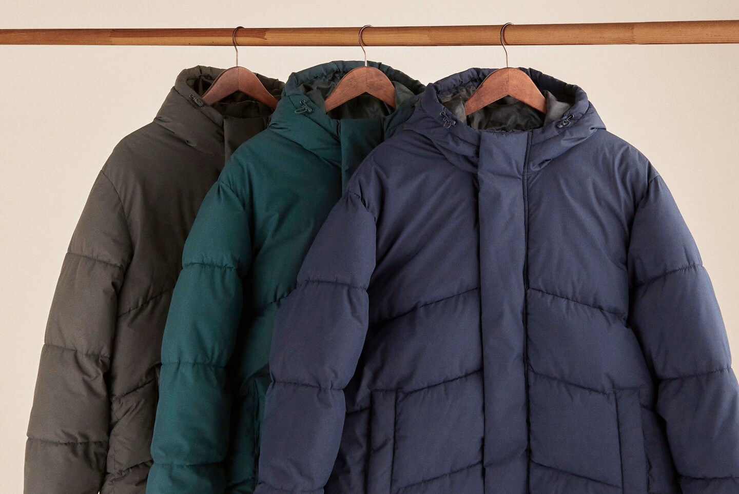 three puffer jackets
