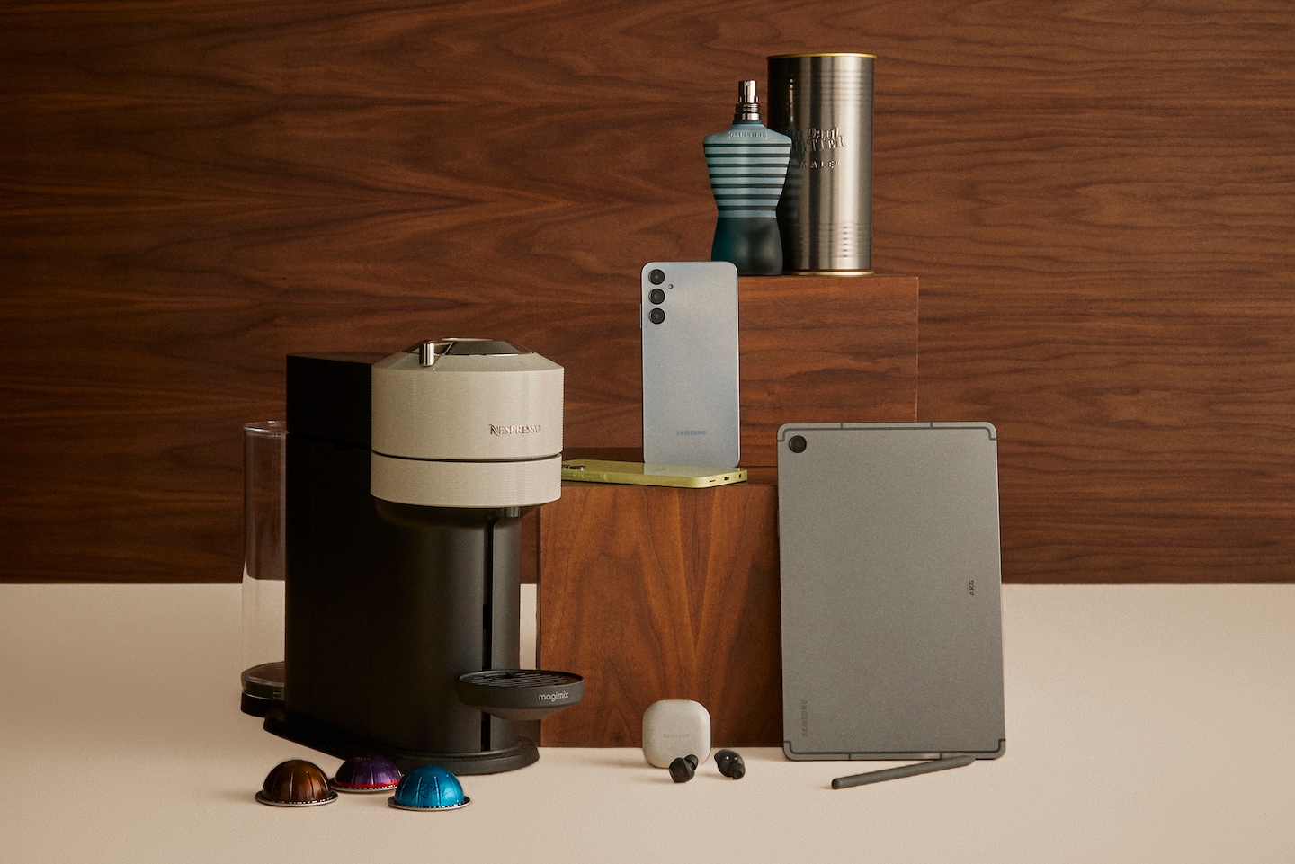 Various gifting items displayed including Nespresso Vertuo Next Coffee Machine, iPhone, Earpods, iPad and JPG Le Male 75ml Eau de Toilette