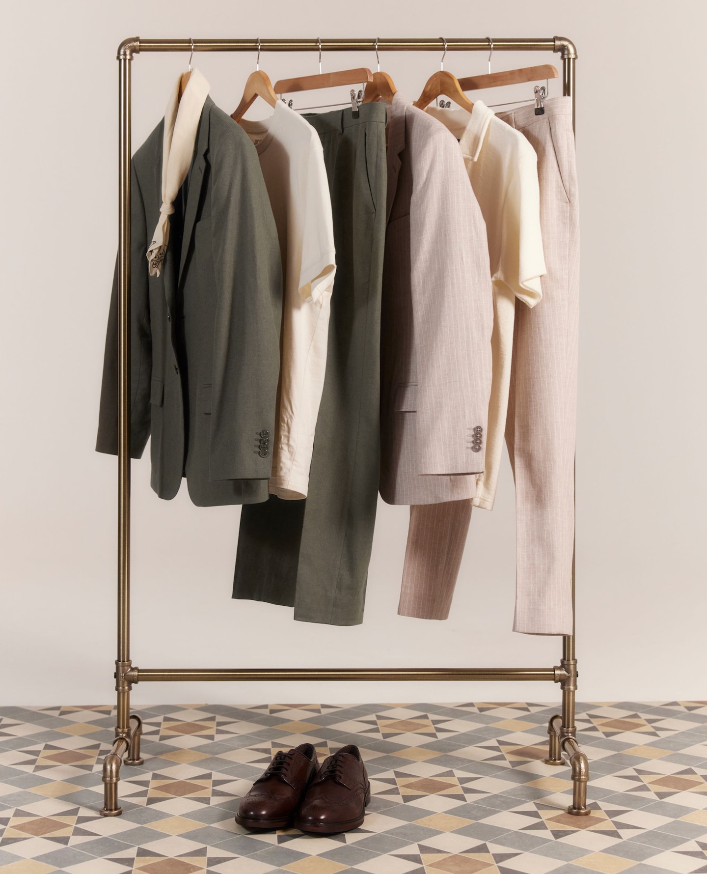 Various formalwear neatly hung up on a rail