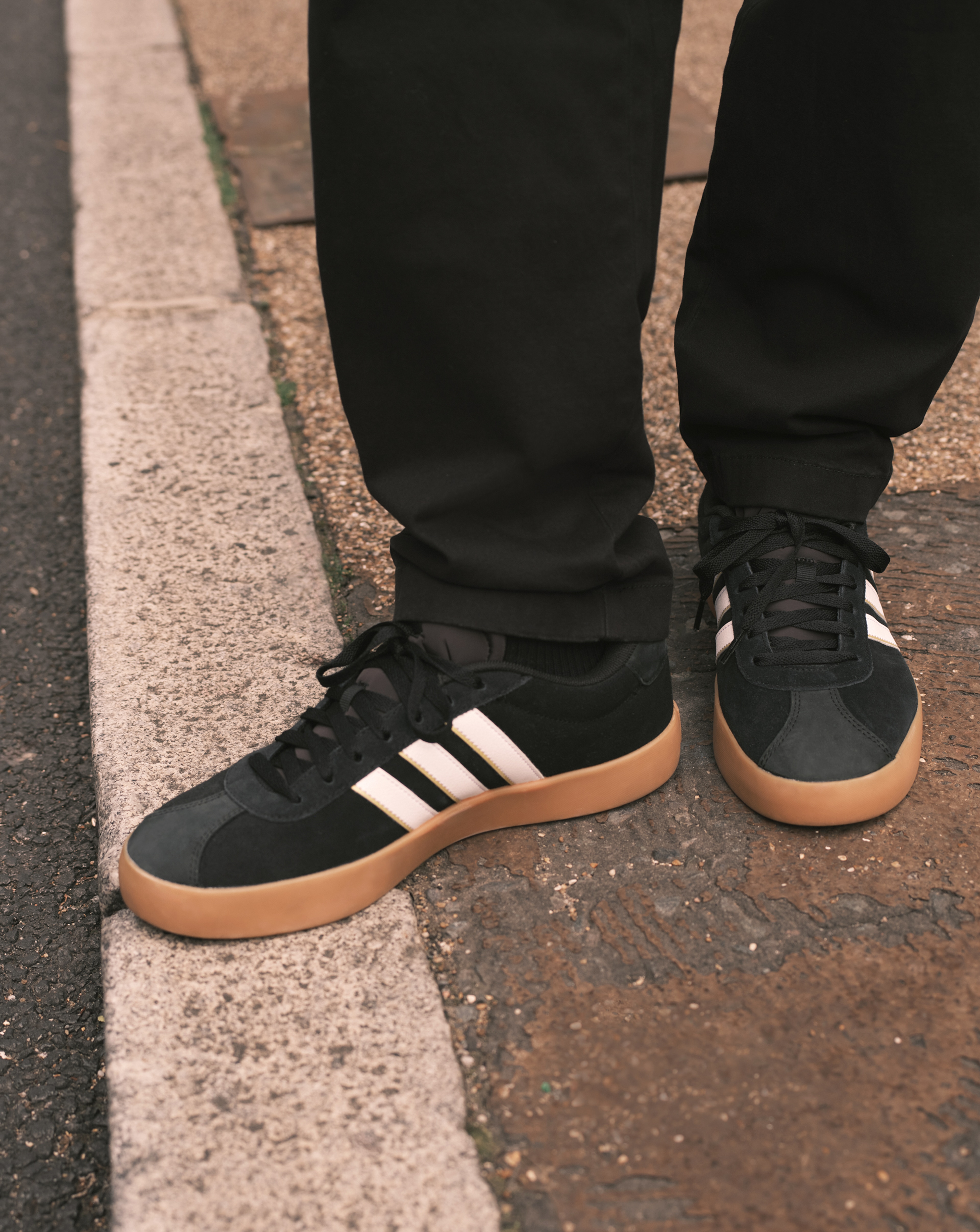 Model wears adidas VL Court 3.0 Trainers