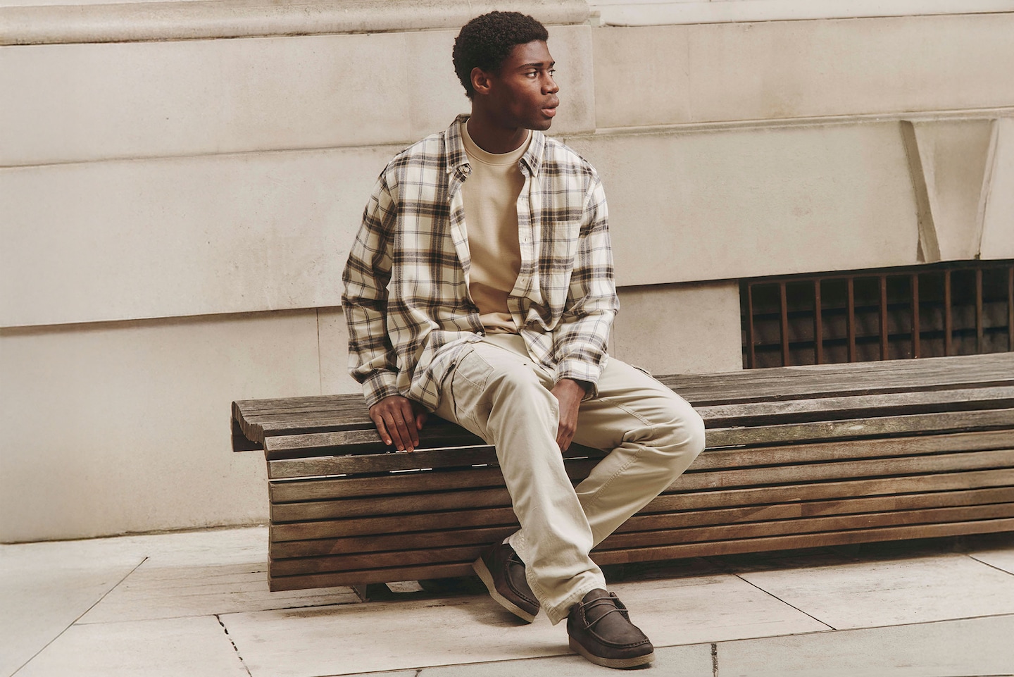 Model wears Cotton Rich Flannel Check Shirt Regular with Elasticated Waist Cuffed Cargo in Cream