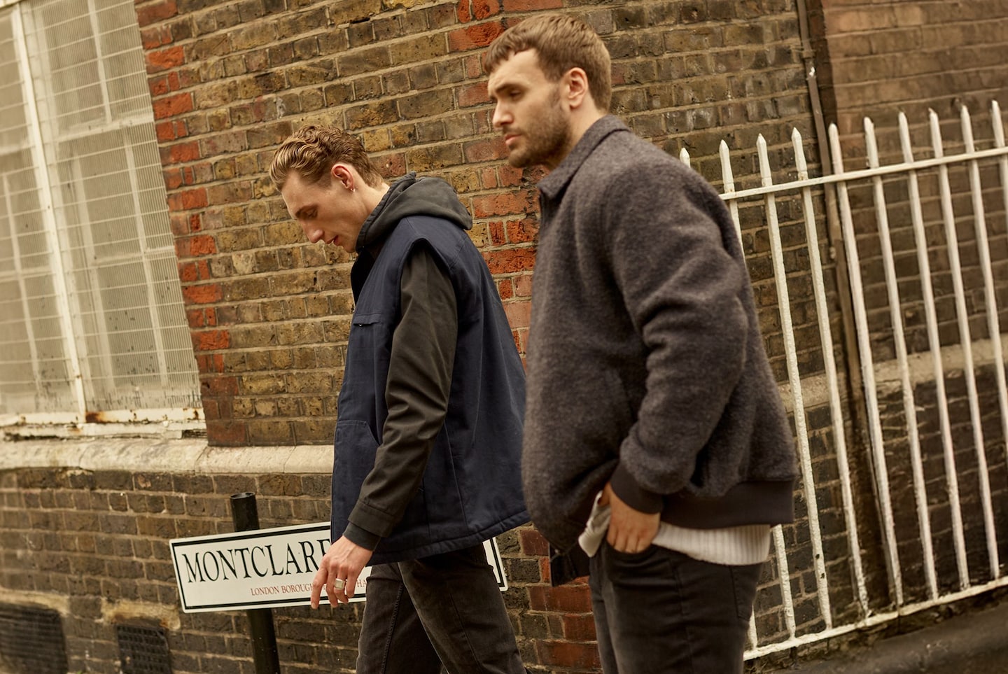 2 men wearing coats