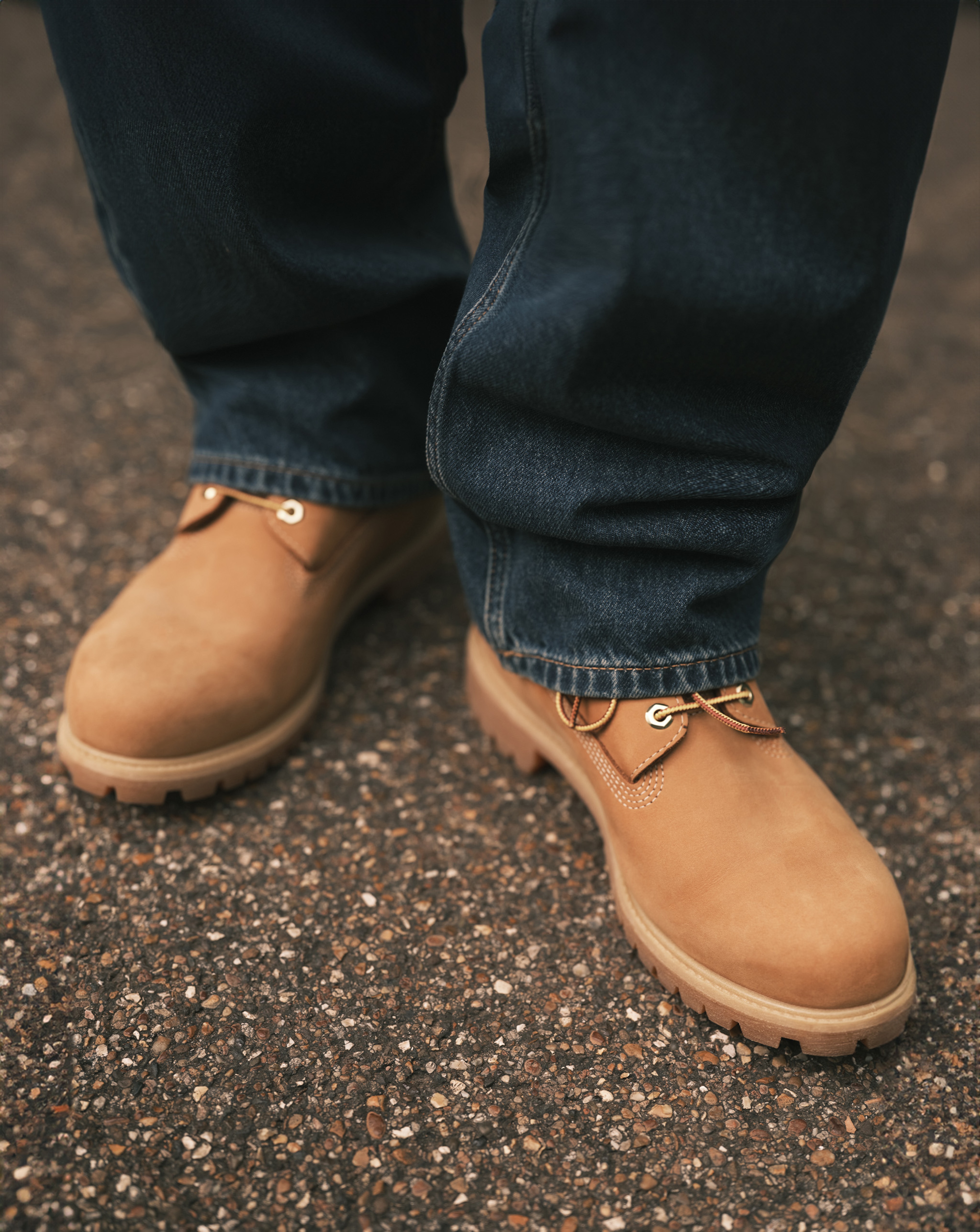 Model wearing brown Timberlands