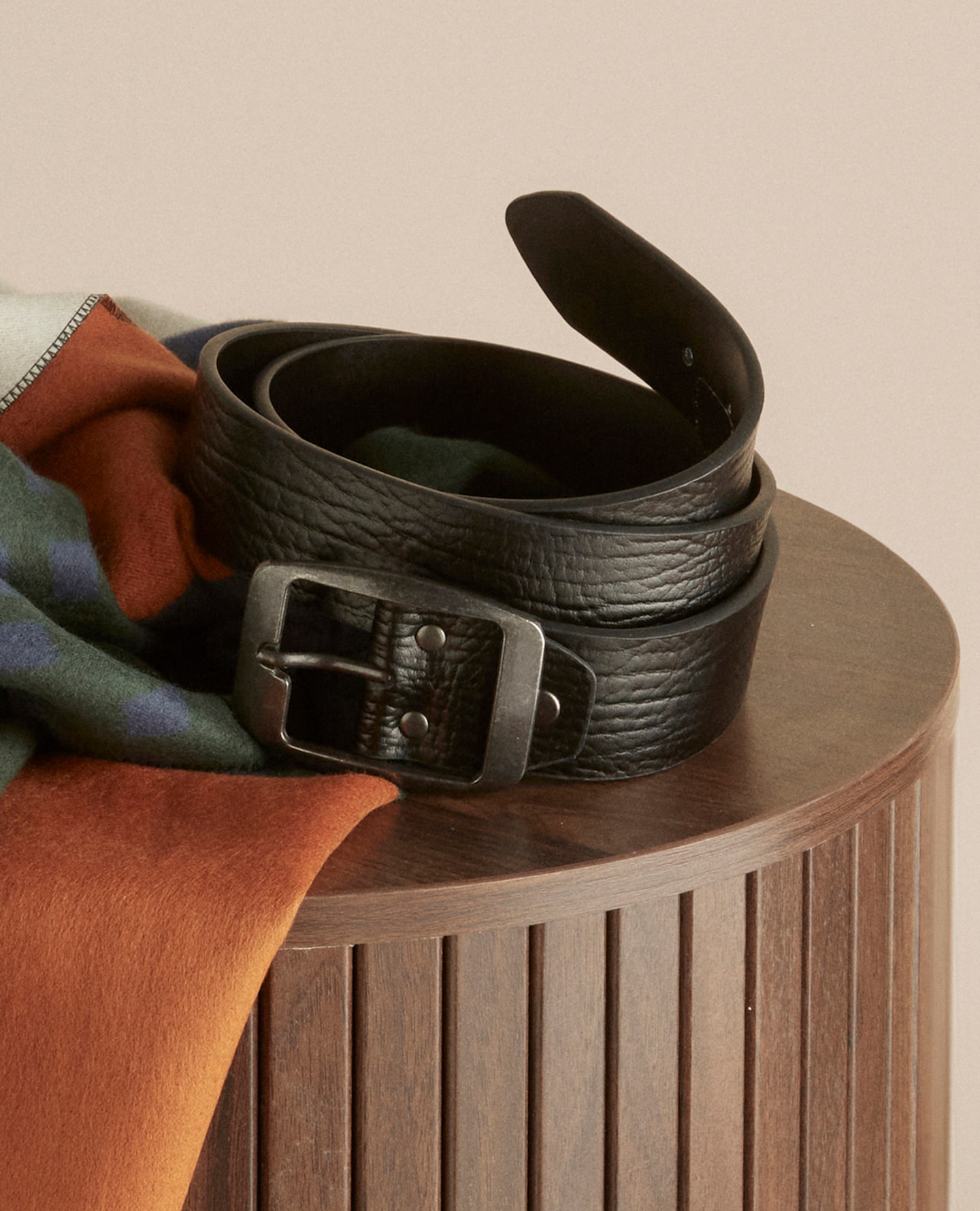 Black Leather Jeans Belt on plinth is pictured