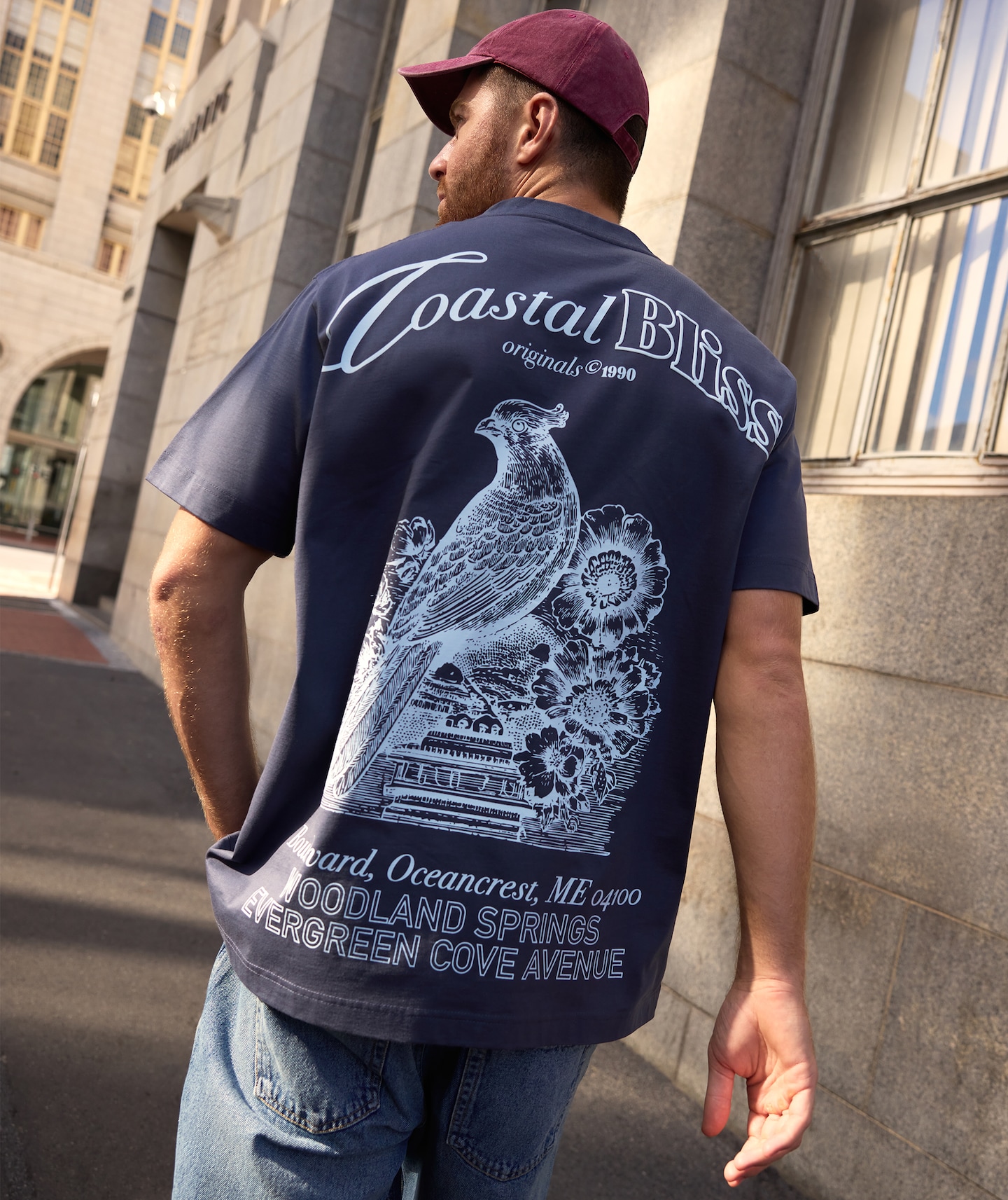 Model wears Jack & Jones Graphic Tee with Denim Shorts