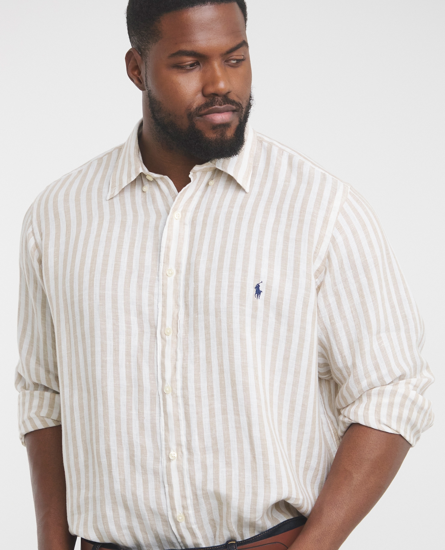 Model wearing Polo Ralph Lauren striped shirt